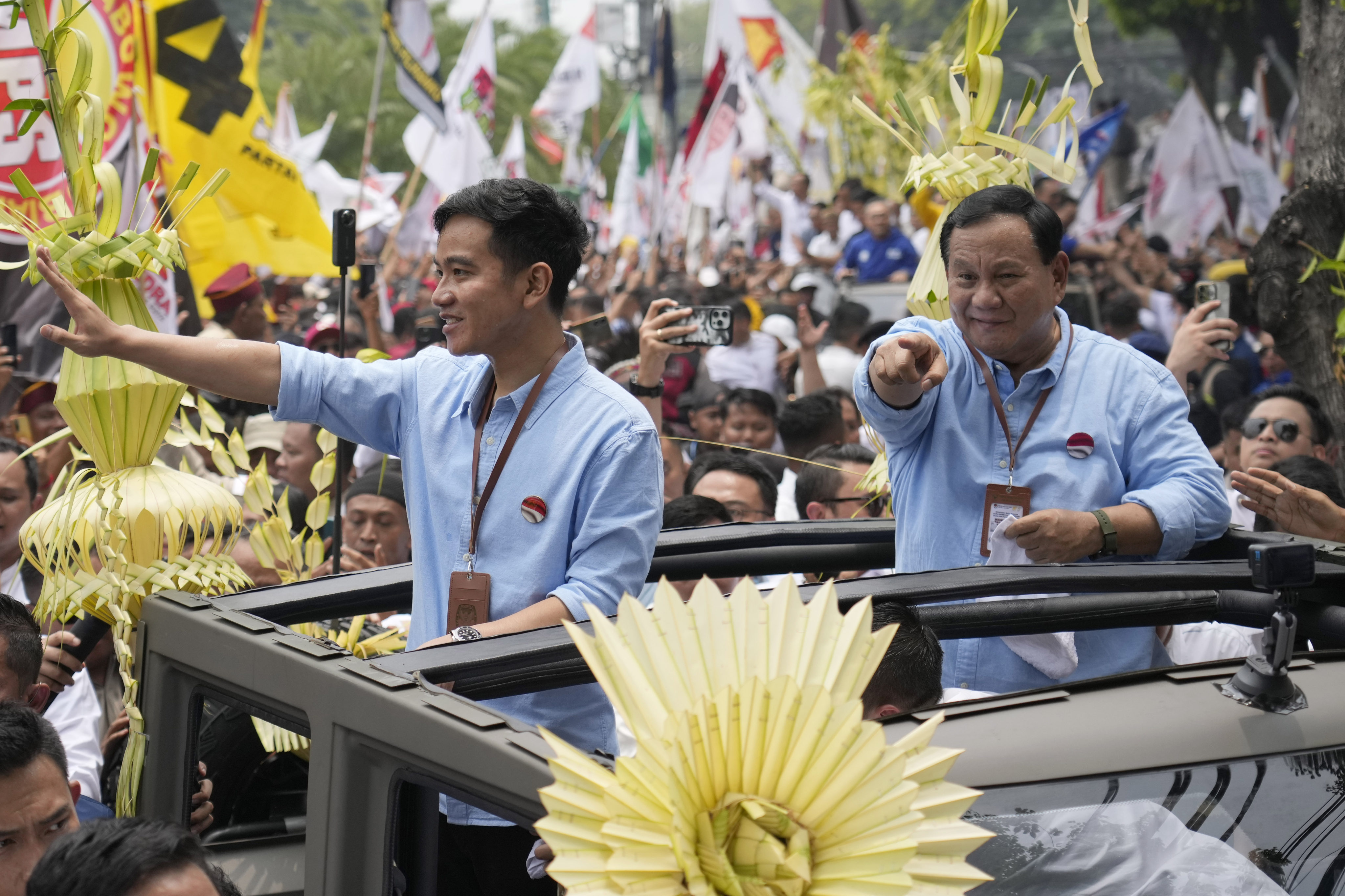 Gibran Rakabuming Raka, the eldest son of President Joko Widodo, greets supporters in October before registering his candidacy to run in the 2024 election. The world’s third-largest democracy is holding legislative and presidential elections in February. Photo: AP
