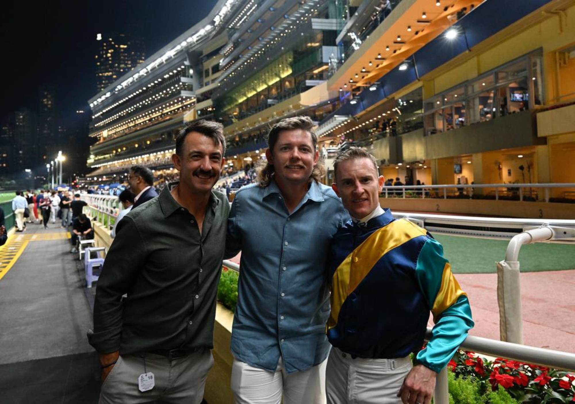 Wade Ormsby, Cameron Smith and Zac Purton between races at Happy Valley on Wednesday night. Photo: Paul Lakatos, Asian Tour