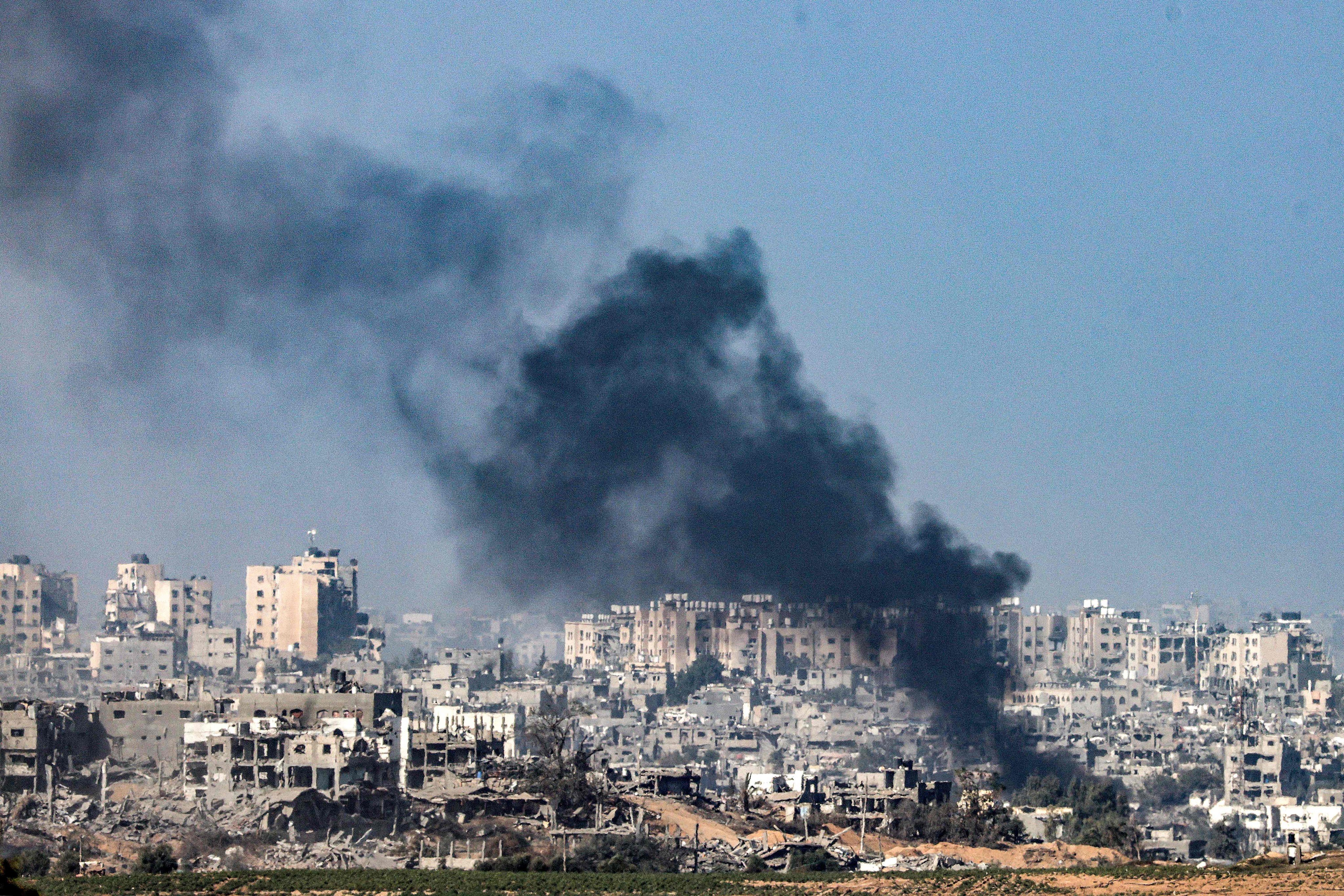 Smoke plumes billow during Israeli bombardment near a position along the border with the Gaza Strip. Airlines have been forced to take longer flights to avoid war zones like the one in Gaza. Photo: AFP