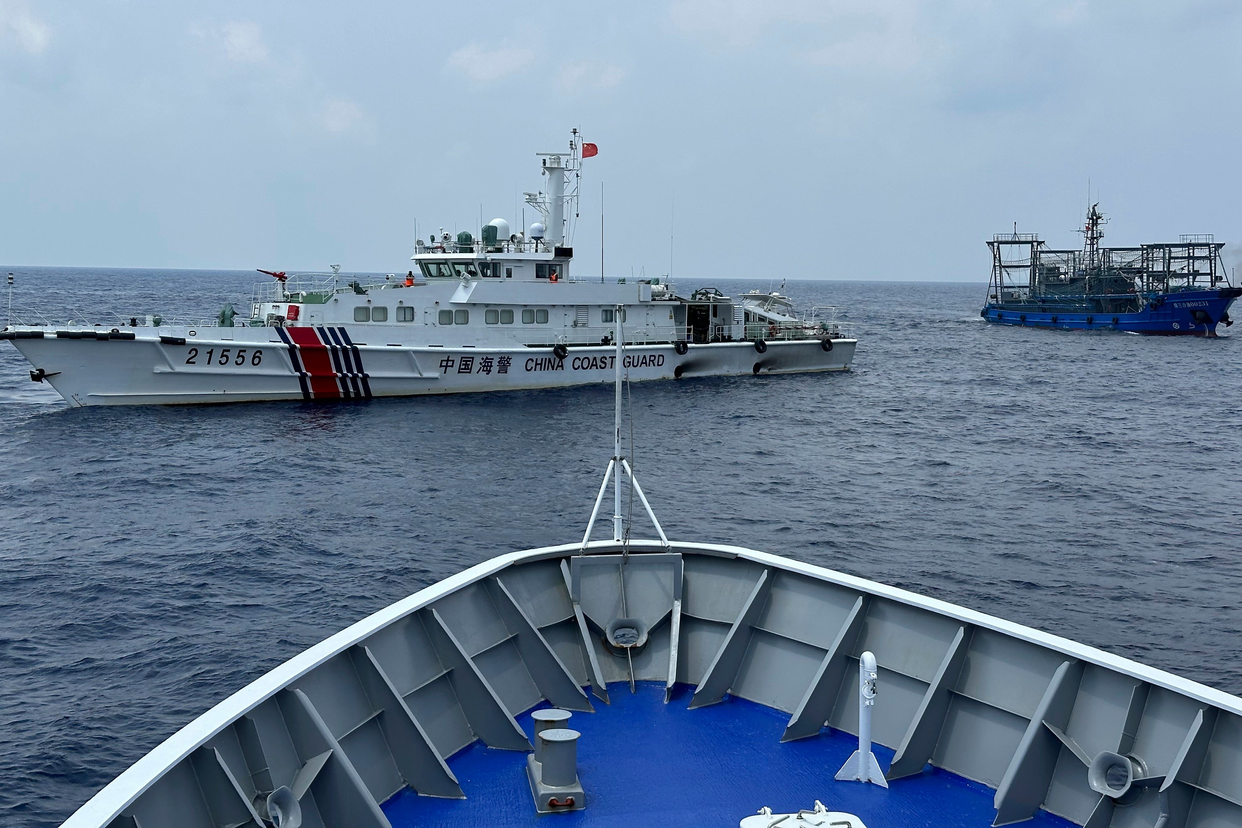 China and the Philippines have again accused each other of illegal behaviour over the Second Thomas Shoal. Weeks earlier, on October 4, a Chinese coastguard ship (left) is pictured with a Chinese militia vessel (right) blocking the Philippine coast guard ship BRP Sindangan. Photo: AP Photo