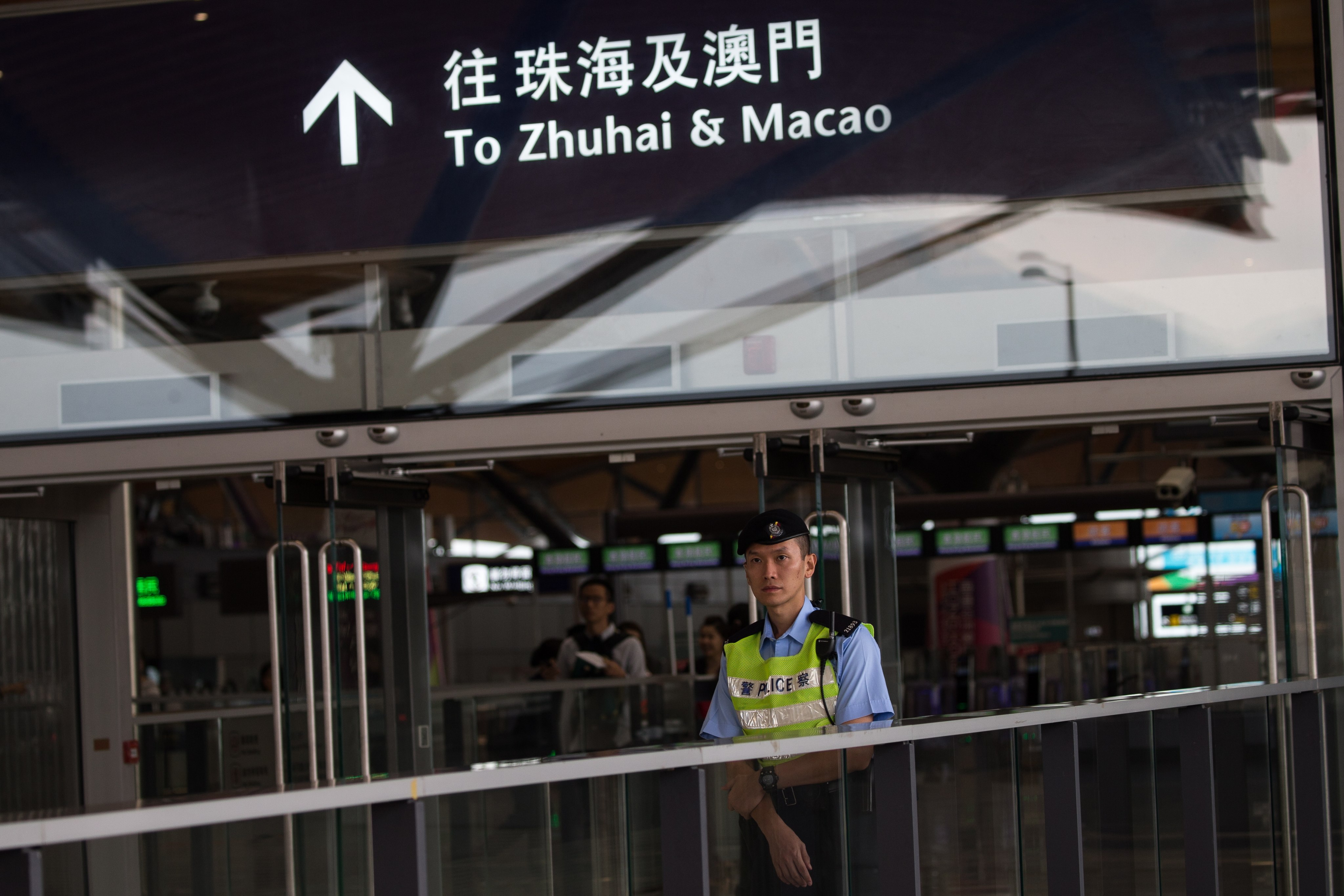 Signage in Hong Kong for passengers taking the bridge to Macau uses the spelling Macao, the same as that used on official documents everywhere except Portugal. Photo: EPA-EFE