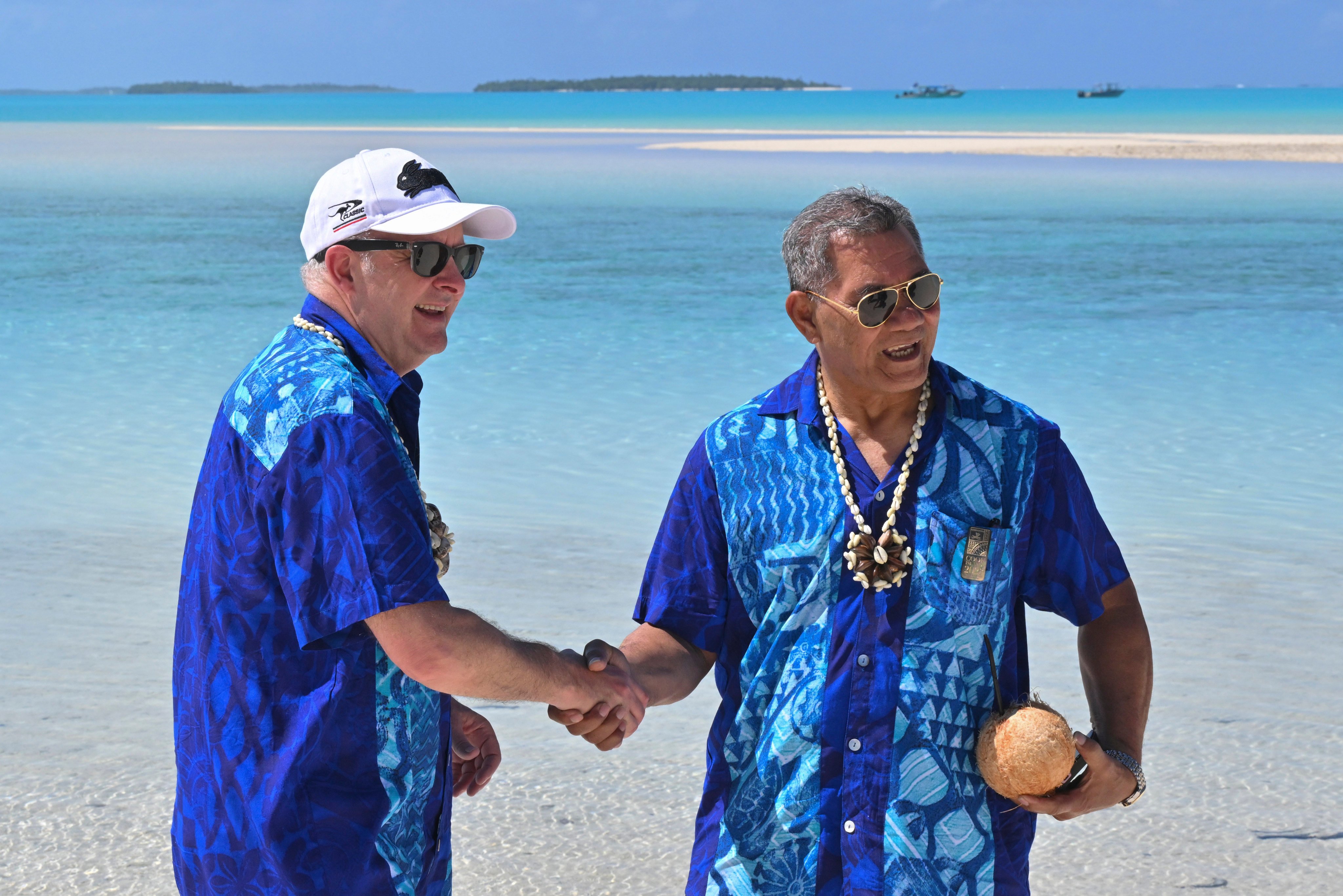 Australian Prime Minister Anthony Albanese (left) and Tuvalu leader Kausea Natano shake hands after attending the Pacific Islands Forum in Aitutaki, Cook Islands, on Thursday. Photo: AAP Image via AP