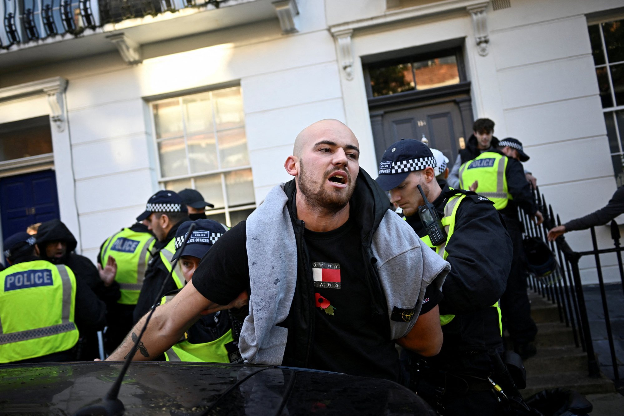 Police make 126 arrests in London as counterprotesters disrupt pro ...