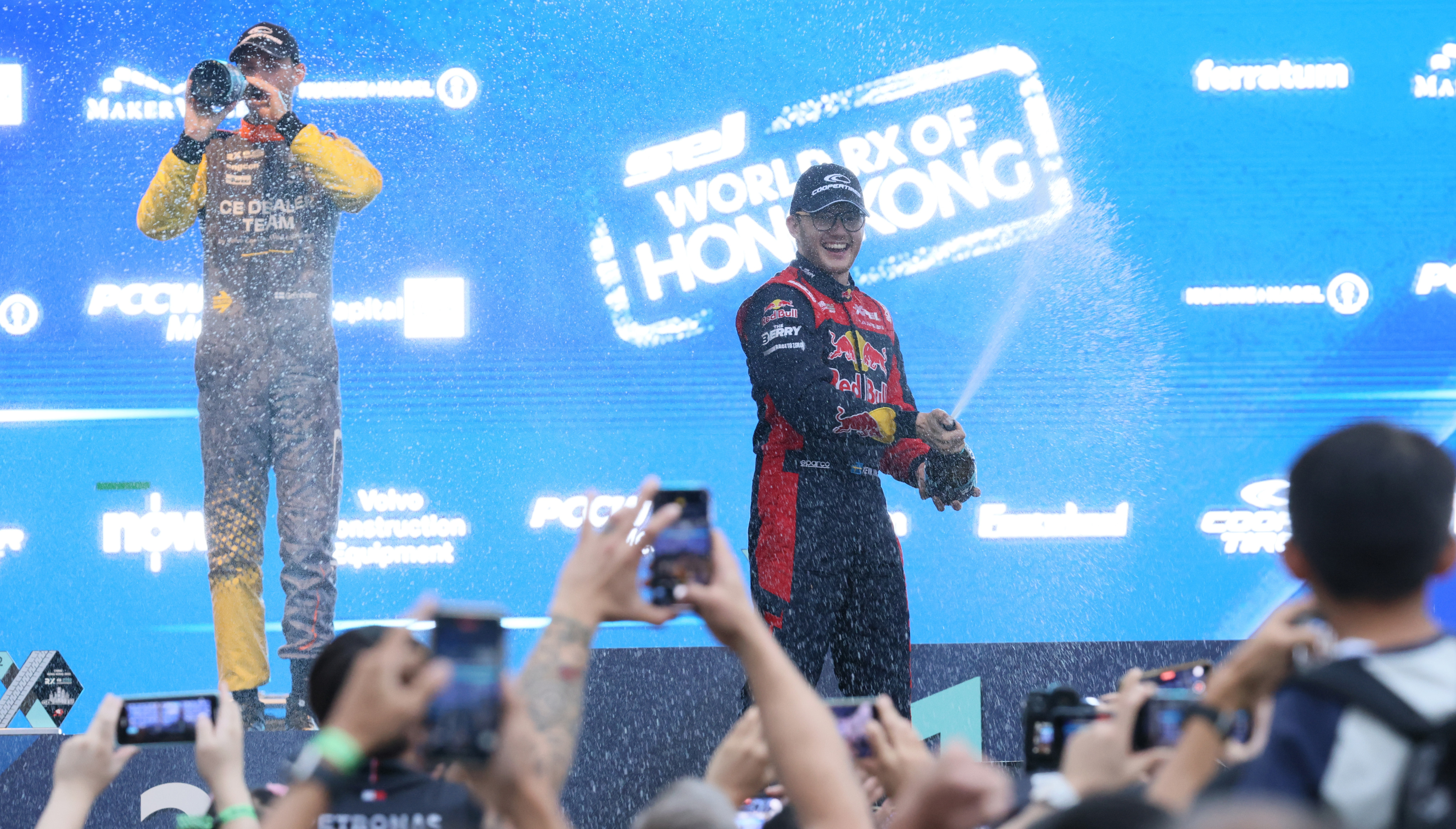 Kevin Hansen of Hansen World RX Team celebrates on the podium after winning the first race of the FIA World Rallycross double header in Hong Kong at the Central Harbourfront Event Space. Photo: Dickson Lee