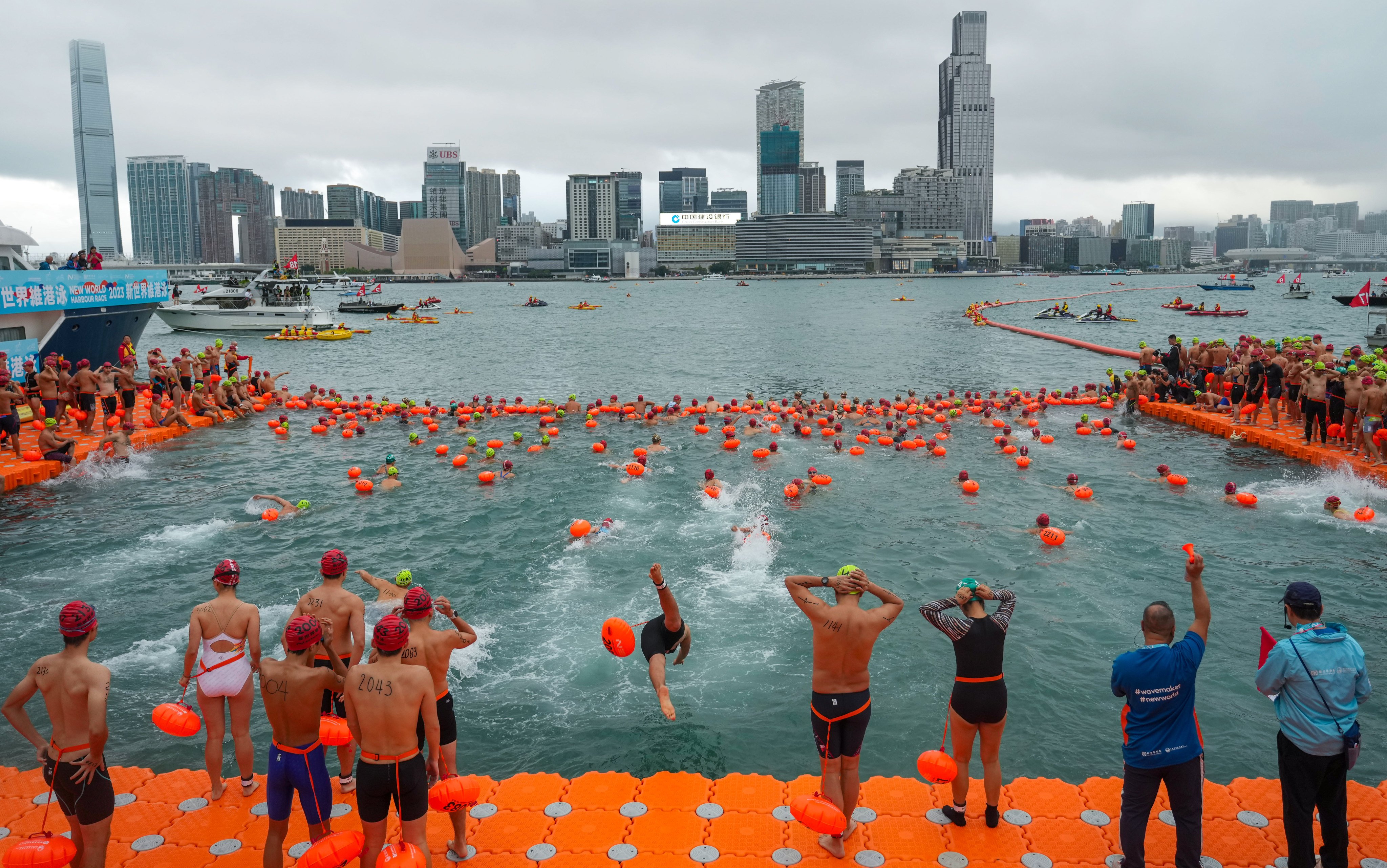 Professional and leisure swimmers descended on the Wan Chai pier on Sunday morning to compete in the event. Photo: Sam Tsang