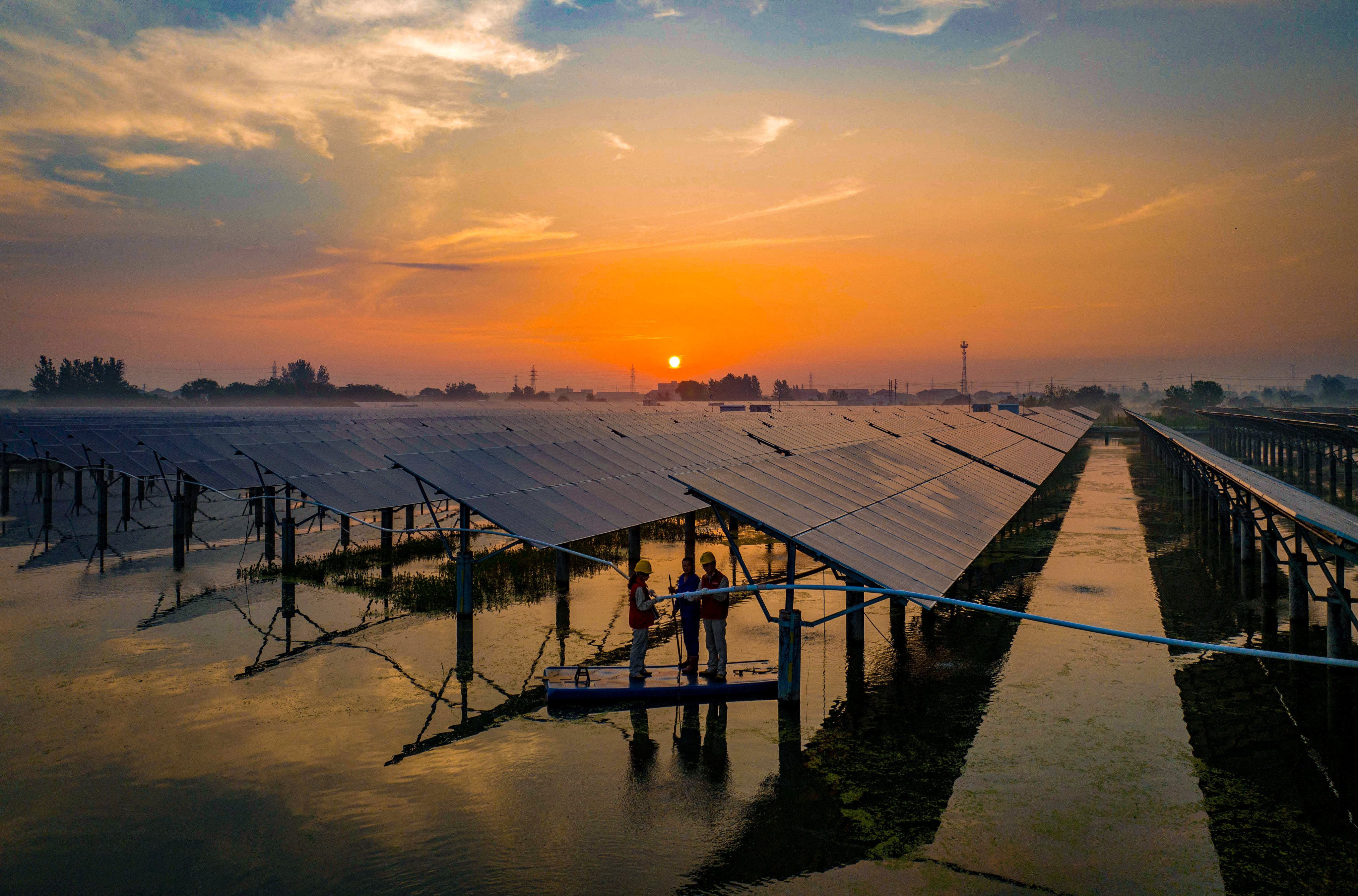 China is expected to add 210 gigawatts of solar energy in 2023, helping to reduce carbon emissions in 2024 after they spiked this year. Photo: AFP