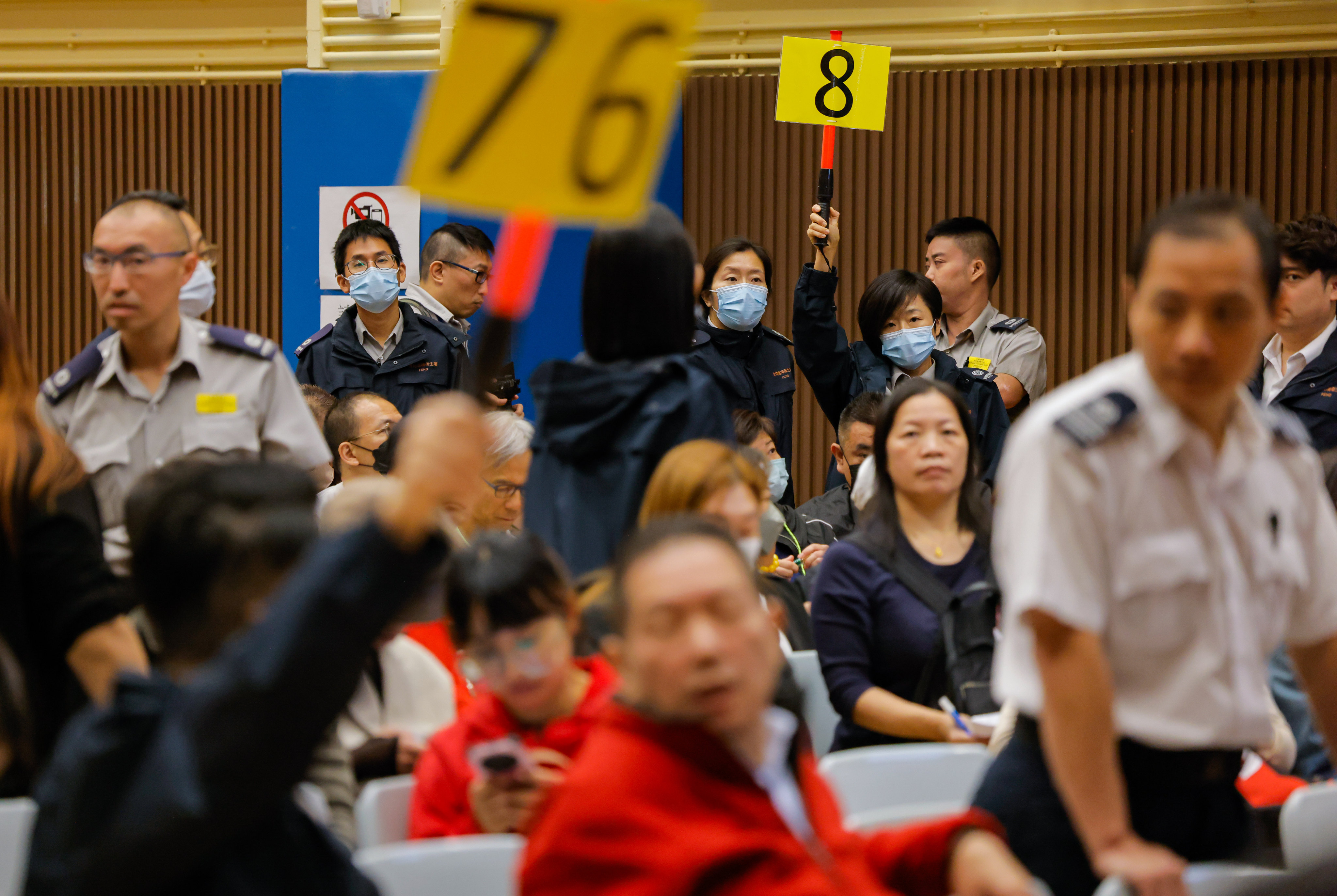 Bidders try to secure stalls for the 2024 Lunar New Year fair at an auction on Monday. Photo: Jelly Tse
