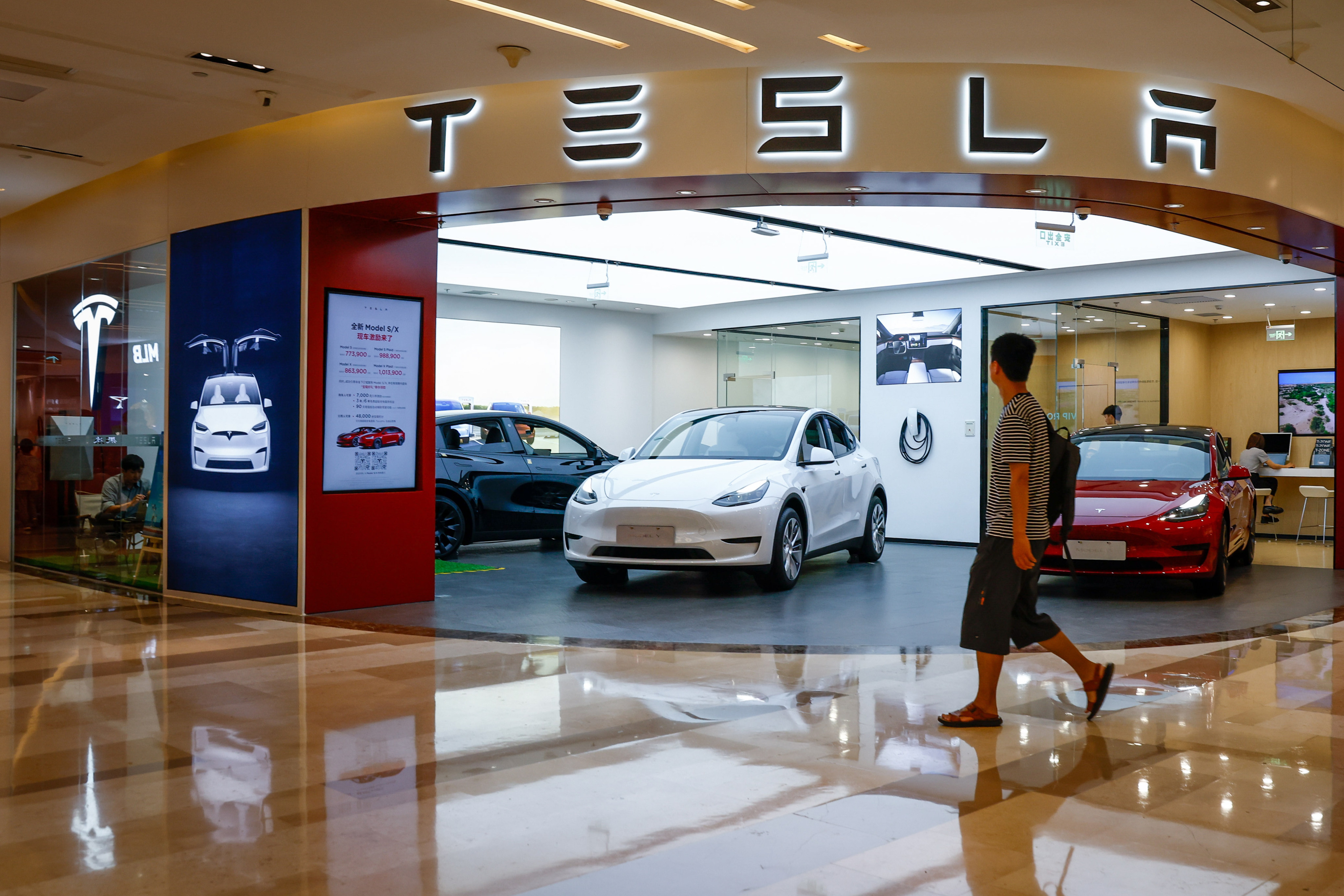 Tesla cars are displayed at a showroom in Beijing, China. The US carmaker’s sales have slowed down in mainland China. Photo: EPA-EFE
