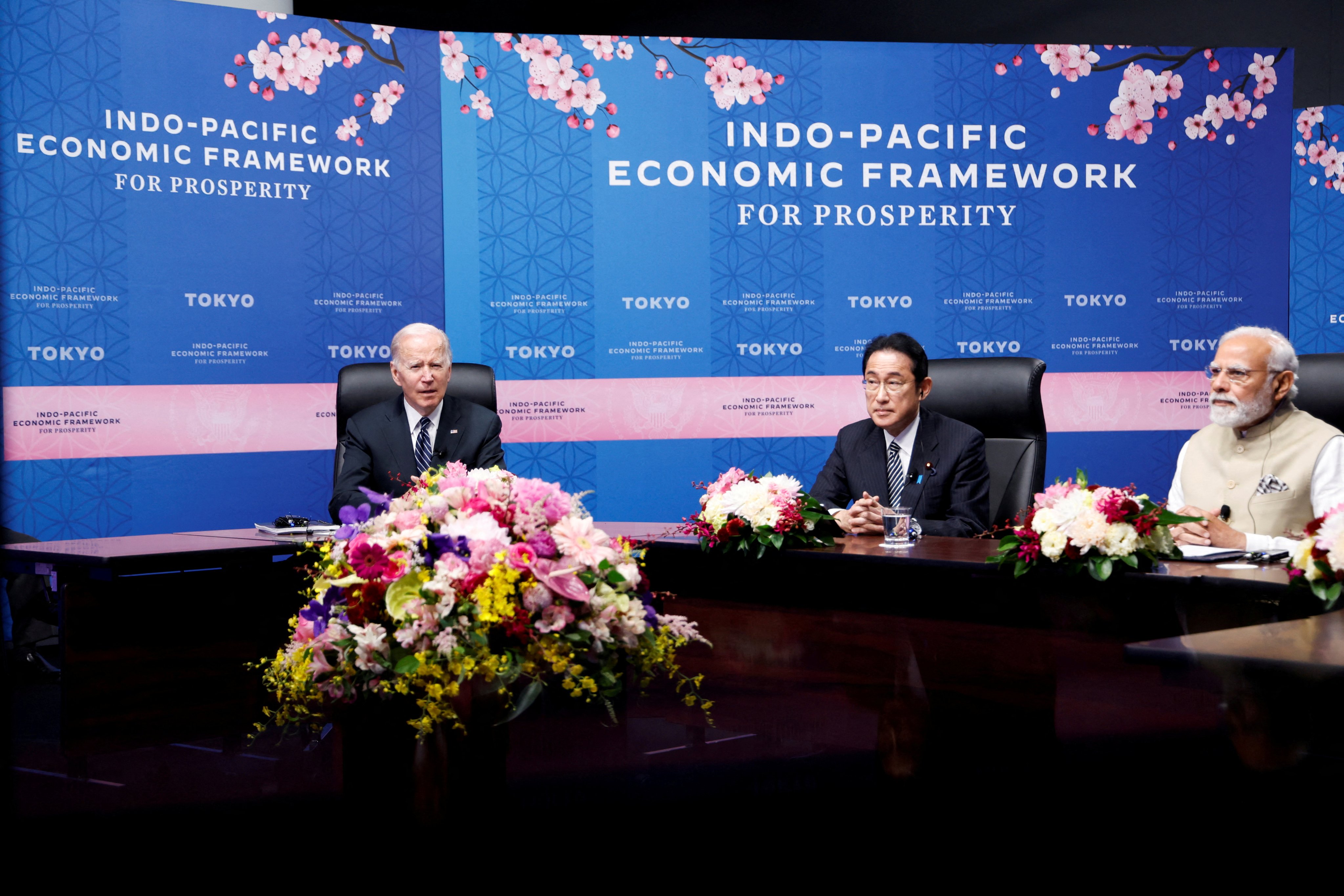 US President Joe Biden delivers remarks alongside Japanese Prime Minister Fumio Kishida and Indian Prime Minister Narendra Modi during the Indo-Pacific Economic Framework for Prosperity launch event in Tokyo on May 23, 2022. Photo: Reuters