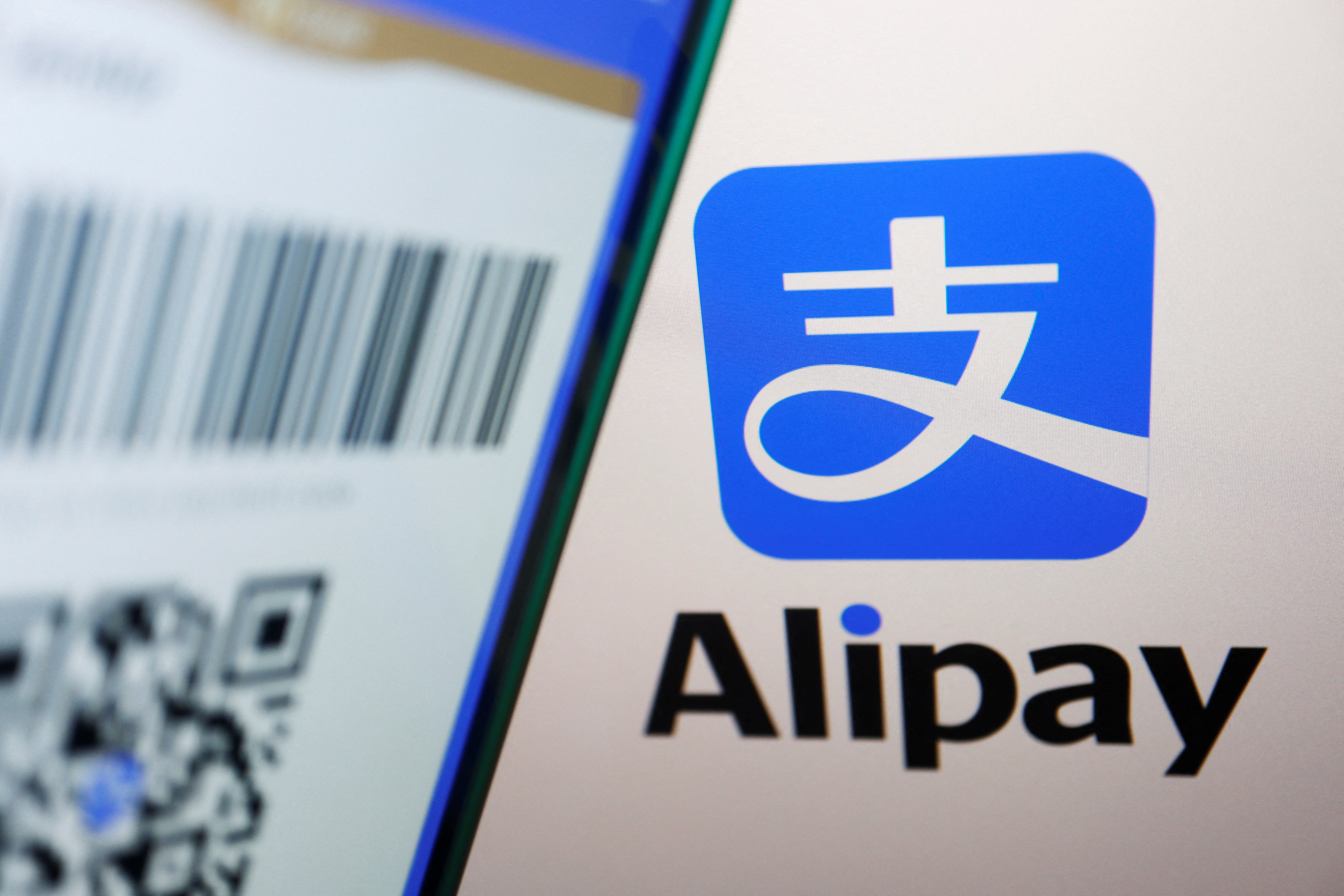 The Alipay logo is displayed next to a QR payment code on the app, in this illustration picture taken June 28, 2023. Photo: Reuters