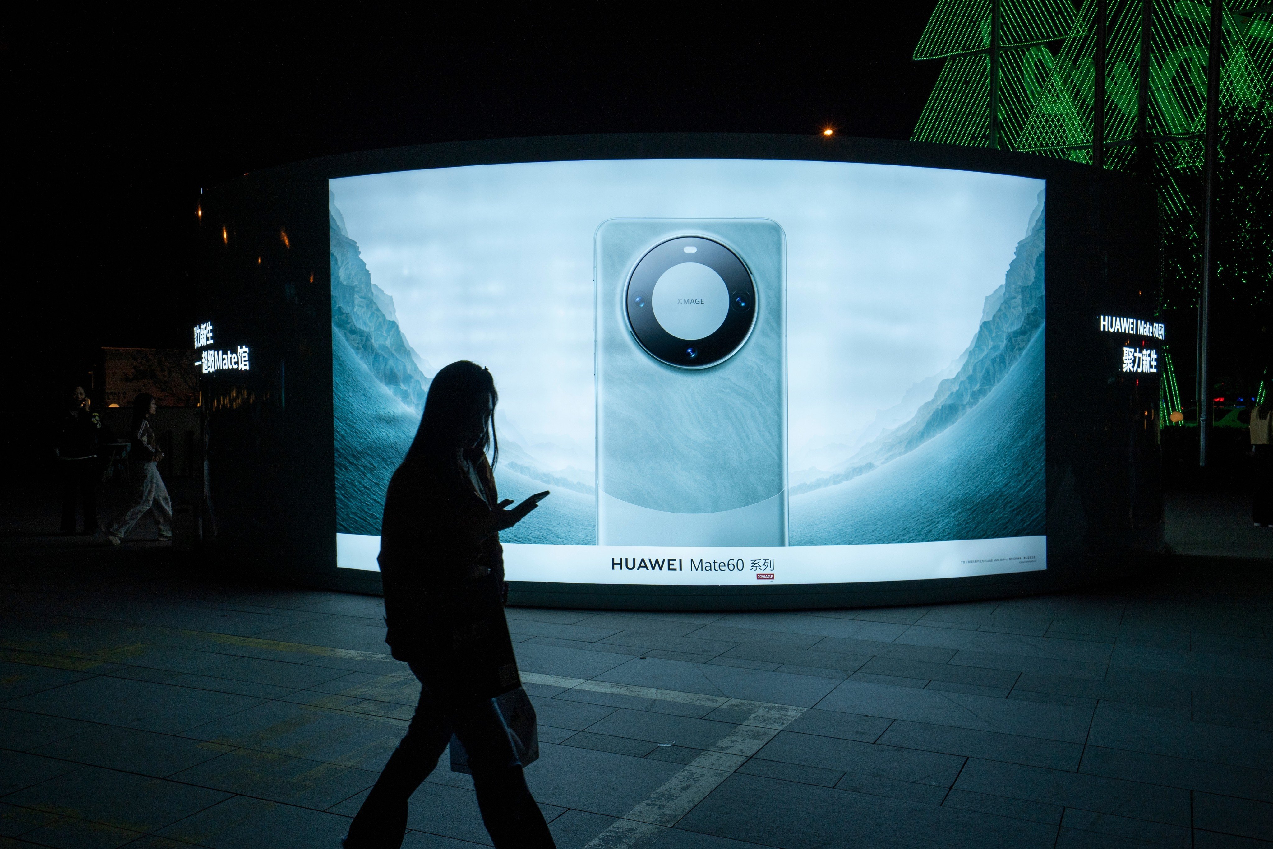 A Huawei Technologies smartphone advertisement at Chaoyang Joy City shopping centre in Beijing. The company’s popular Mate 60 Pro 5G handset continues to experience supply shortages. Photo: Shutterstock