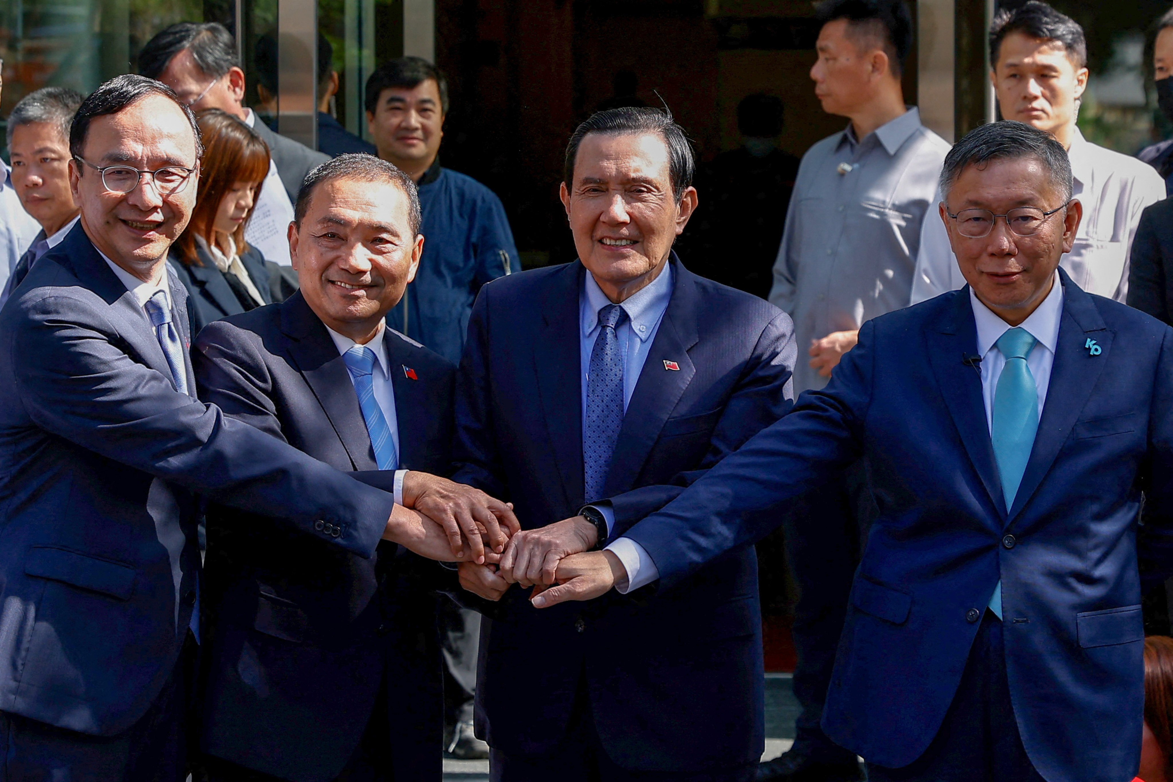 (From left) KMT chairman Eric Chu, KMT presidential candidate Hou Yu-ih, former president Ma Ying-jeou and TPP chairman Ko Wen-je in Taipei on Wednesday. Photo: Reuters