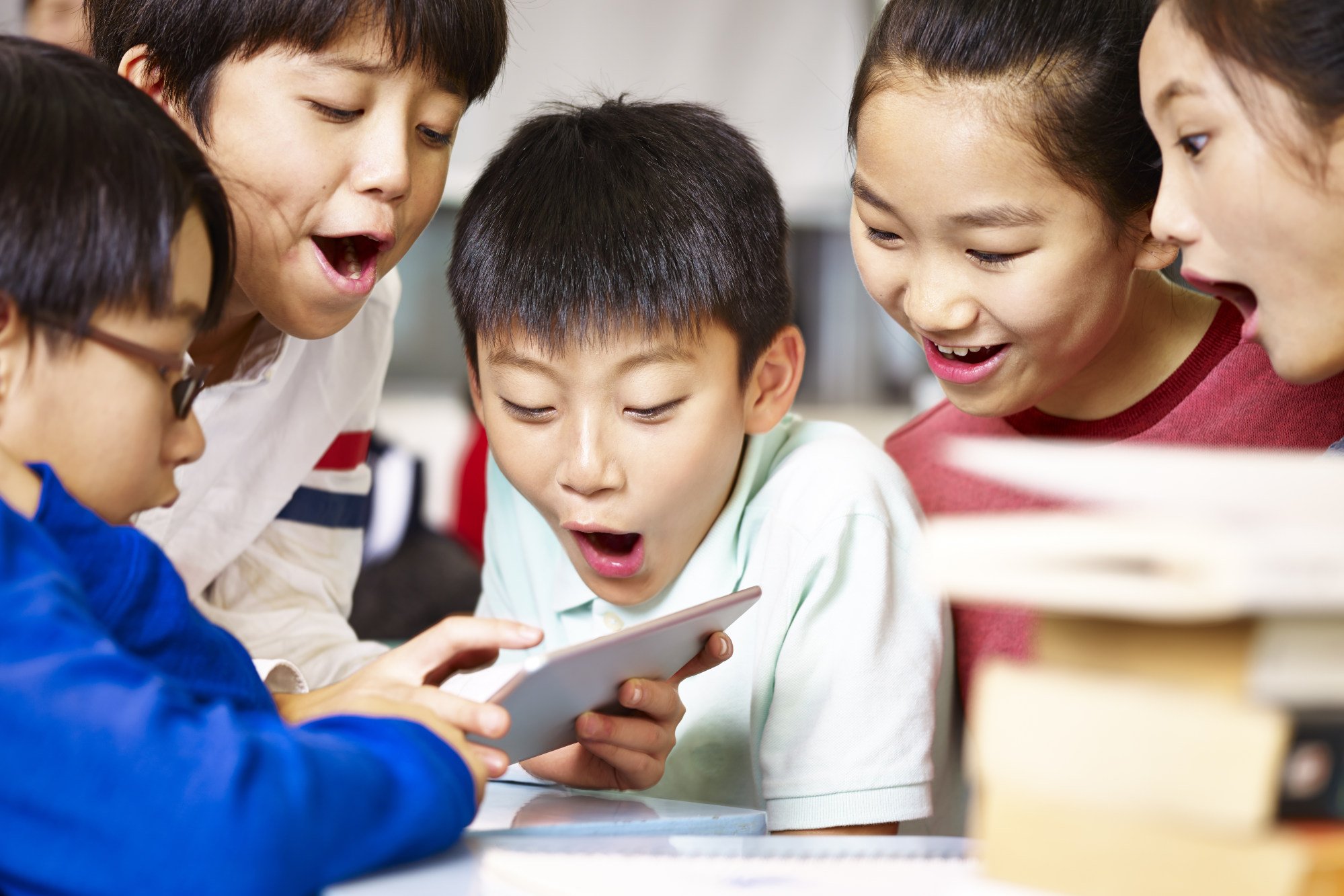Children in China are often put under immense pressure by their parents to perform to a standard of excellence at school. Photo: Shutterstock