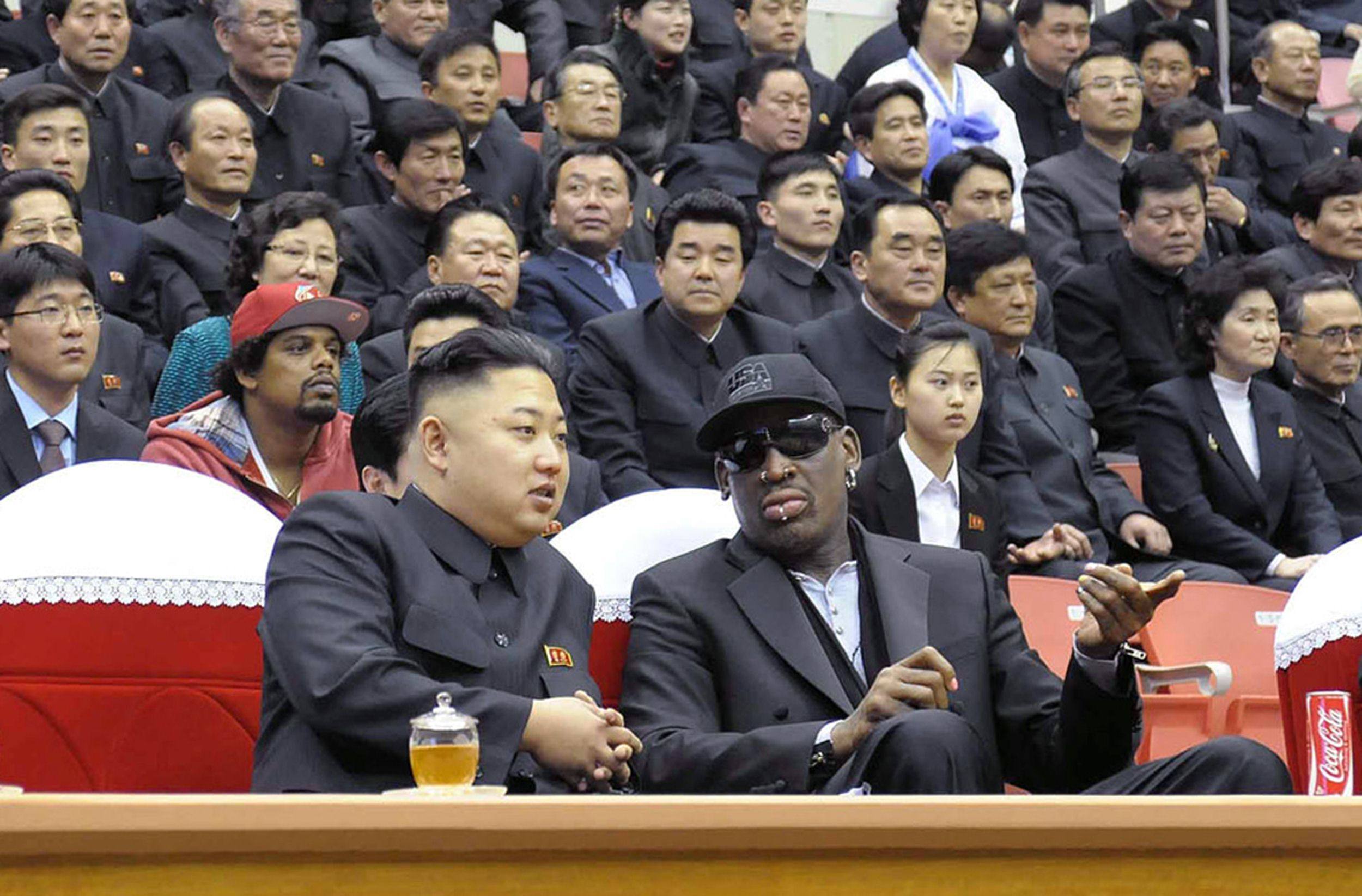 North Korean leader Kim Jong-un and former NBA star Dennis Rodman speaking at a basketball game in Pyongyang in March 2013. Photo: KCNA  