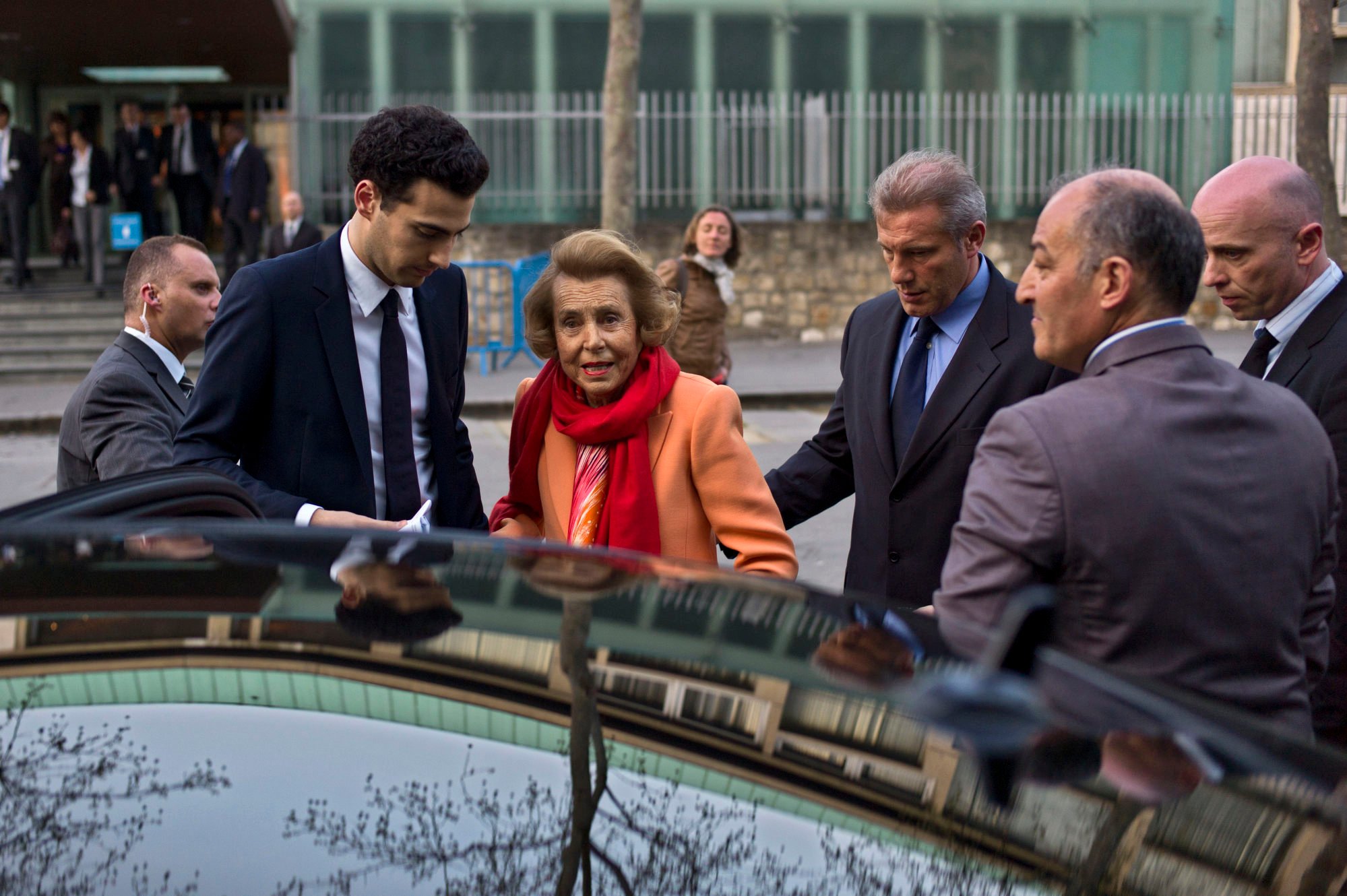 François-Marie Banier was accused of taking advantage of L’Oreal heiress Liliane Bettencourt’s (centre) mental state to extract millions in art, cash and favours from her. Photo: AP