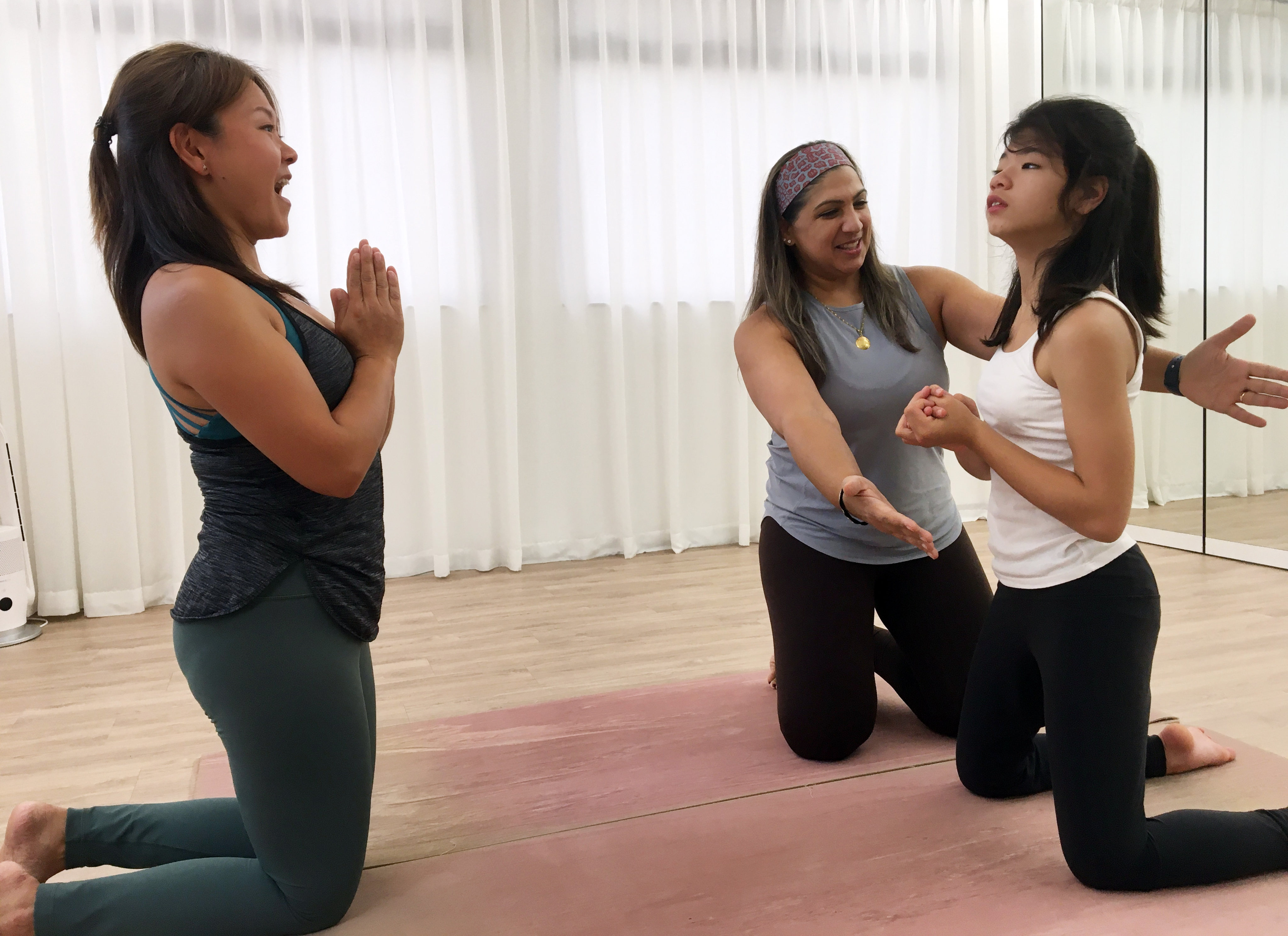 Yoga poses can be especially challenging for individuals such as Elia (right), who has hemorrhagic telangiectasia, a disease in which blood vessels do not develop properly. Photo: Cindy Sui