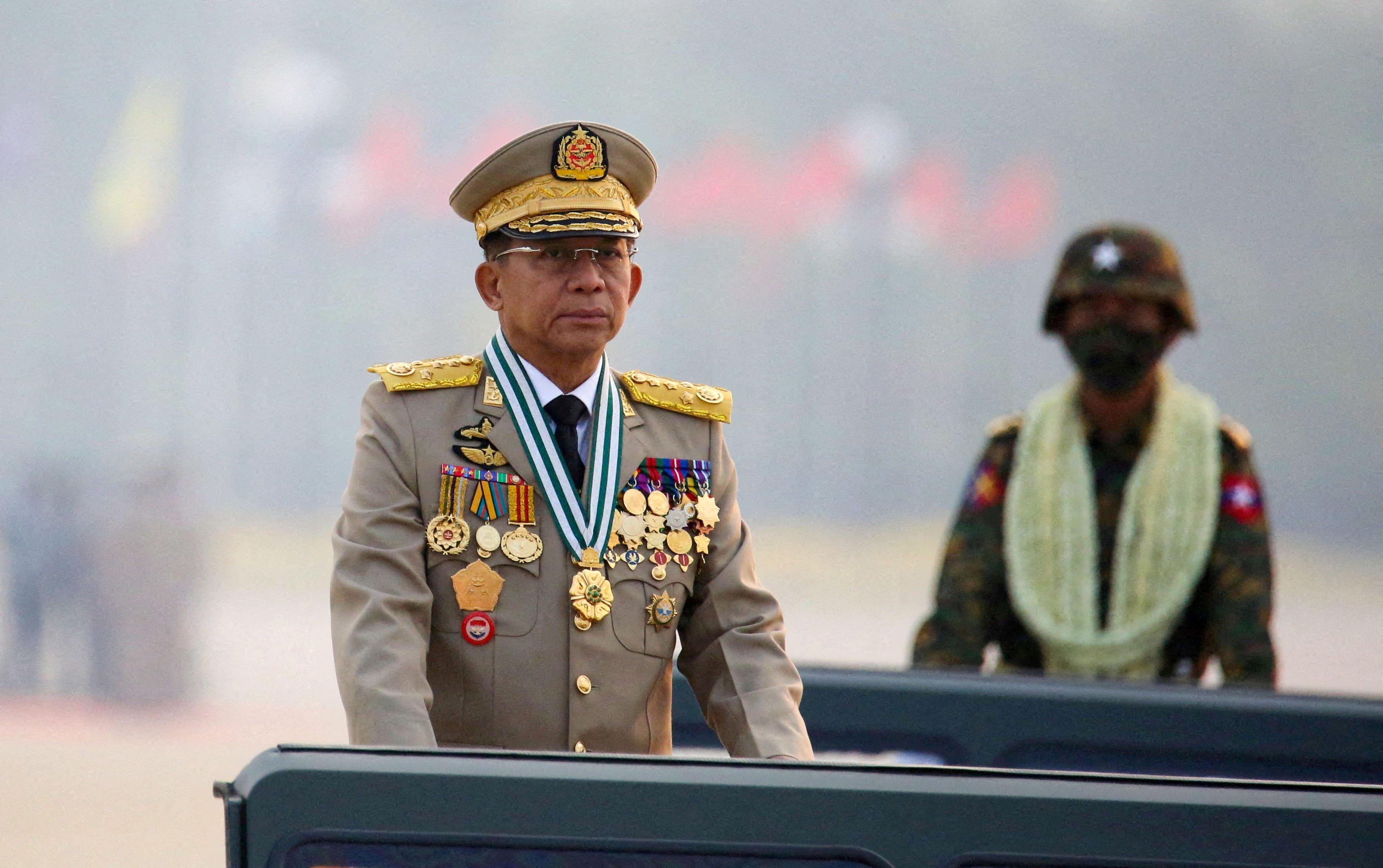 Myanmar’s junta leader General Min Aung Hlaing at an army parade in 2021. Two of his confidantes have been purged for corruption. Photo: Reuters