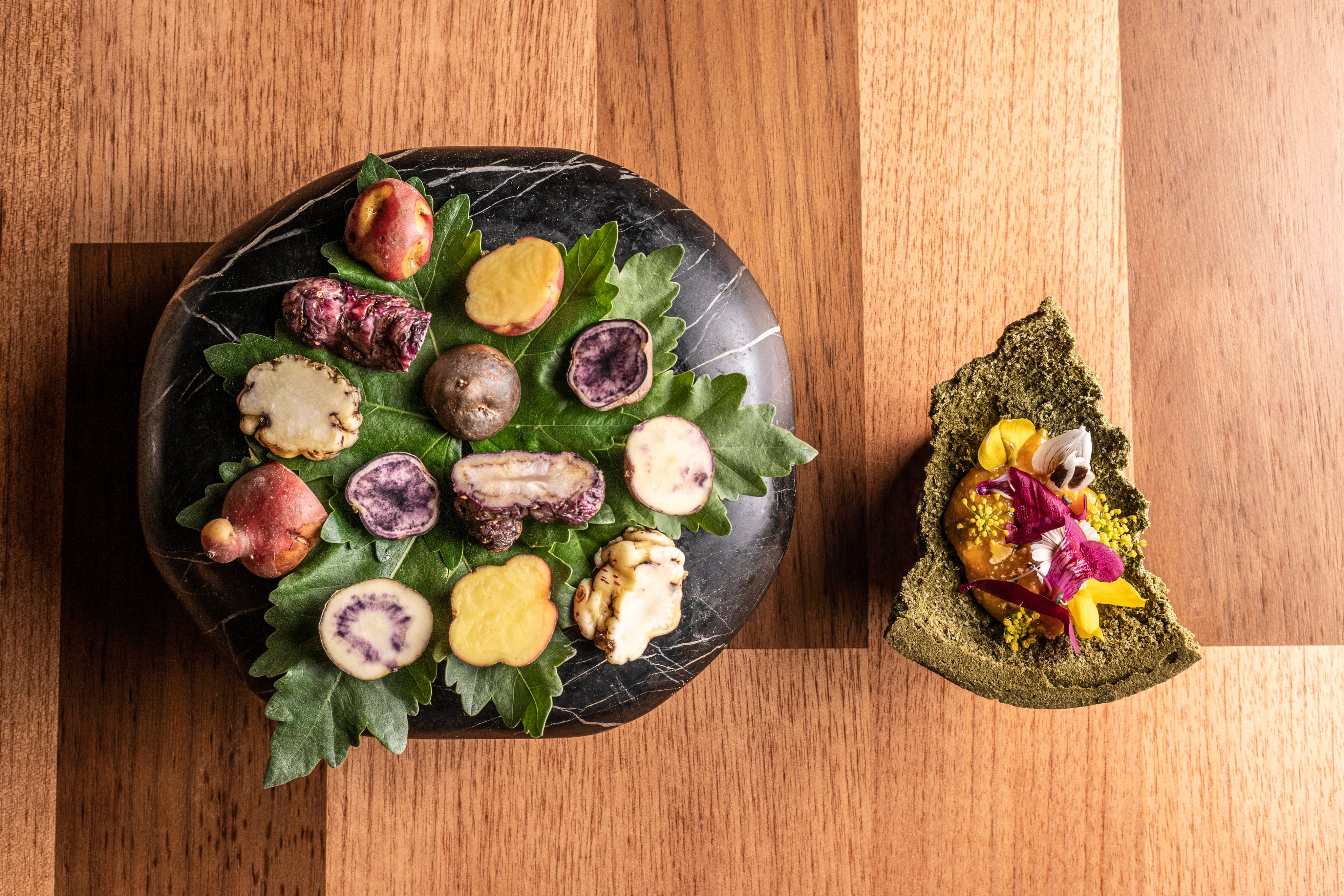 Mil’s menu makes use of Peru’s myriad varieties of potatoes (left), and native ingredients including pungent herbs (right). The restaurant was opened by the same people behind Central, winner of the 2023 World’s 50 Best Restaurants title. Photo: Ken Motohasi