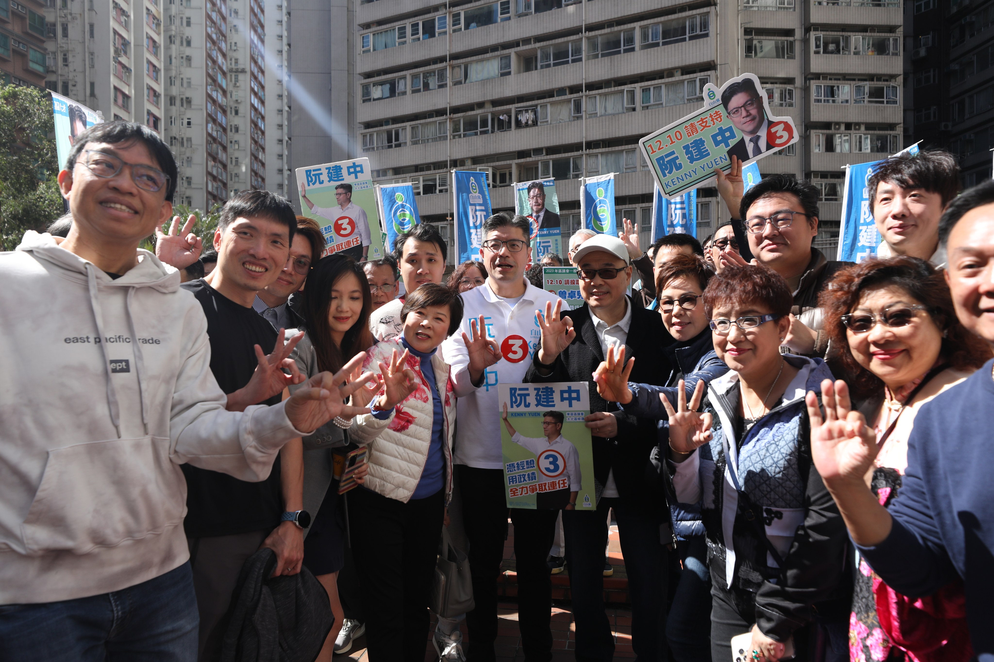A Liberal Party election candidate hits the streets of North Point with supporters on Saturday. Photo: Xiaomei Chen
