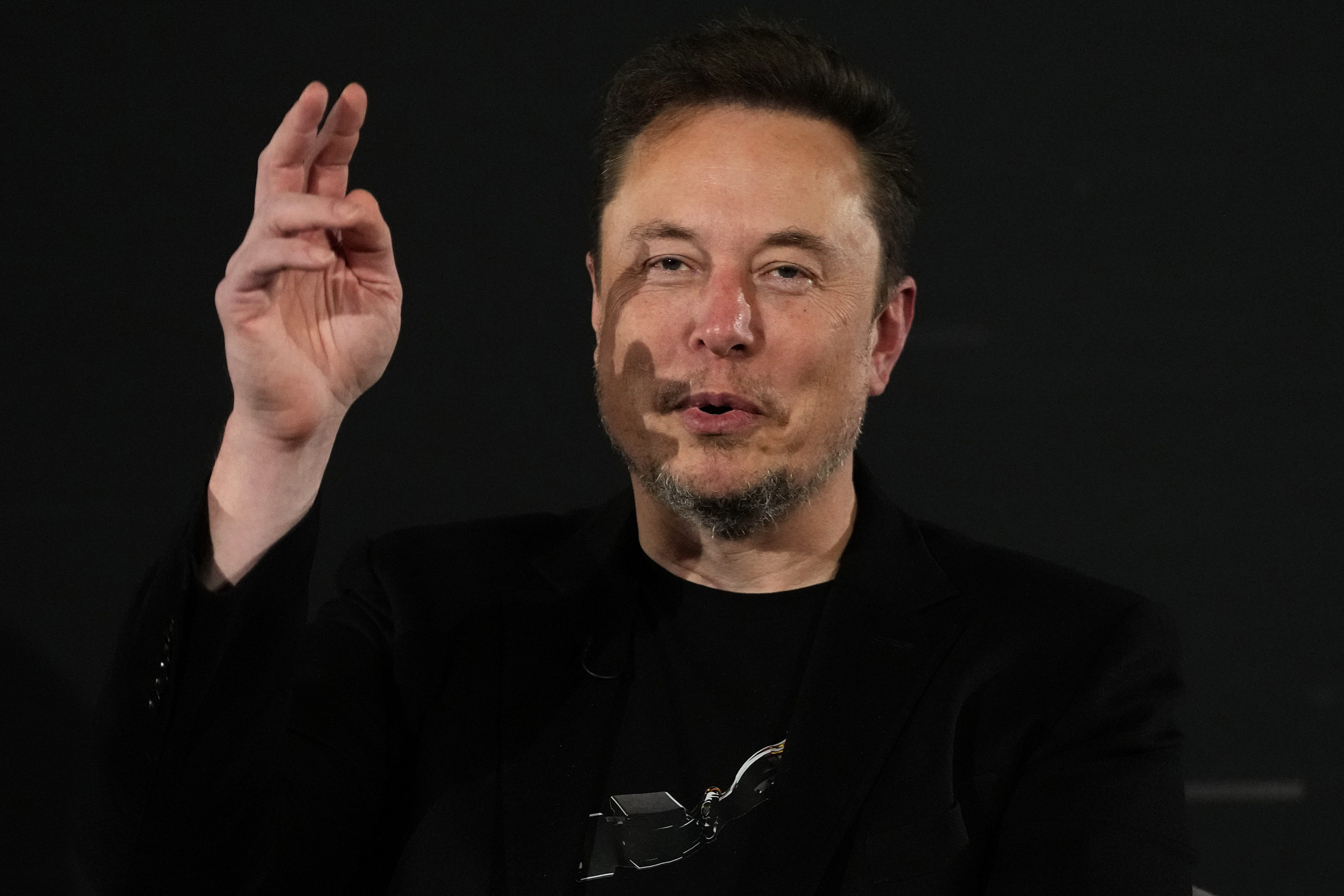 Elon Musk, owner of social media platform X, gestures during an event in London on November 2. Photo: AP