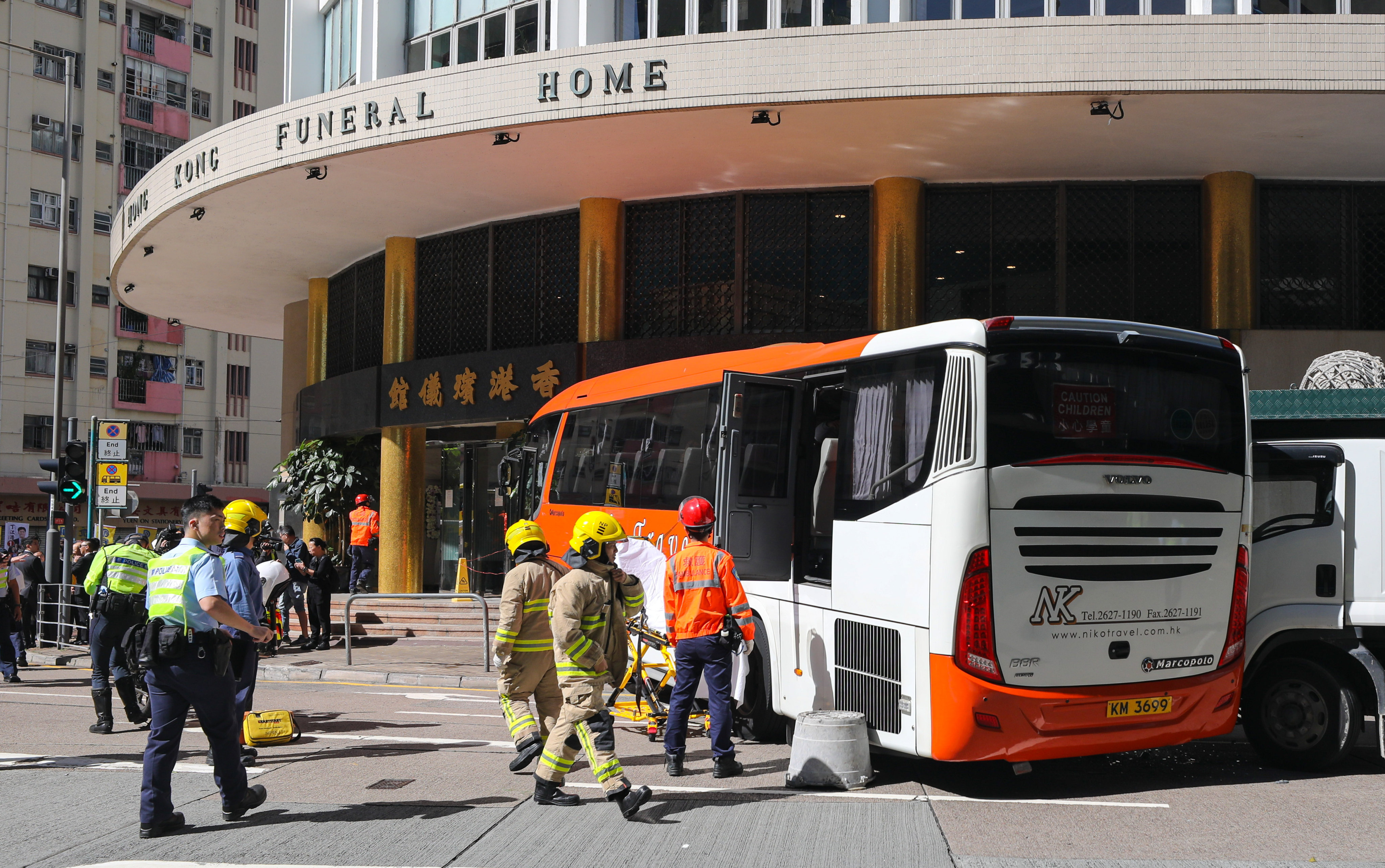 Ten passengers and two funeral home staff were injured in the crash. Photo: Xiaomei Chen