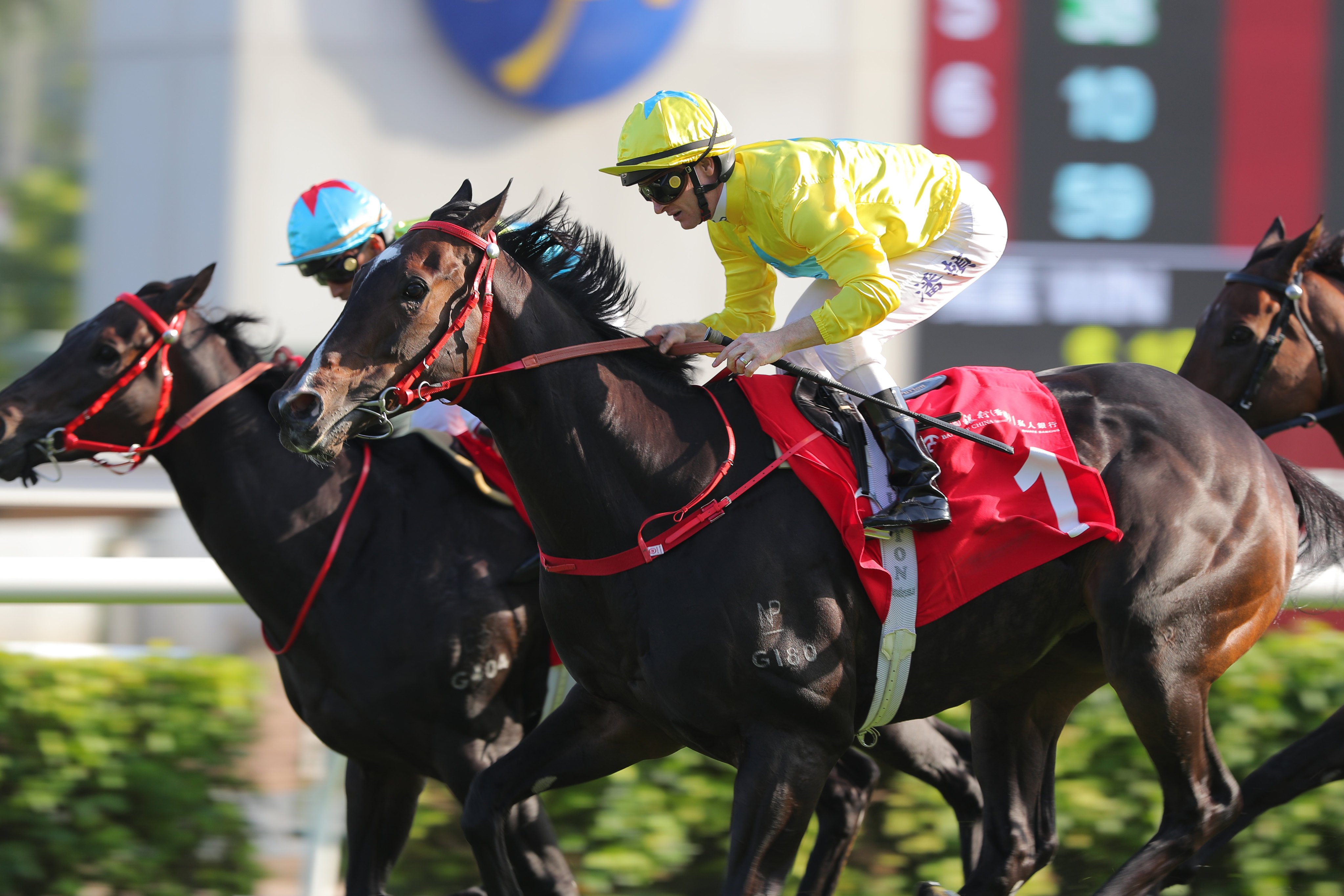Lucky Sweynesse (yellow colours) runs down Victor The Winner to secure back-to-back Group Two BOCHK Private Banking Jockey Club Sprint (1,200m) titles at Sha Tin on Sunday. Photos: Kenneth Chan