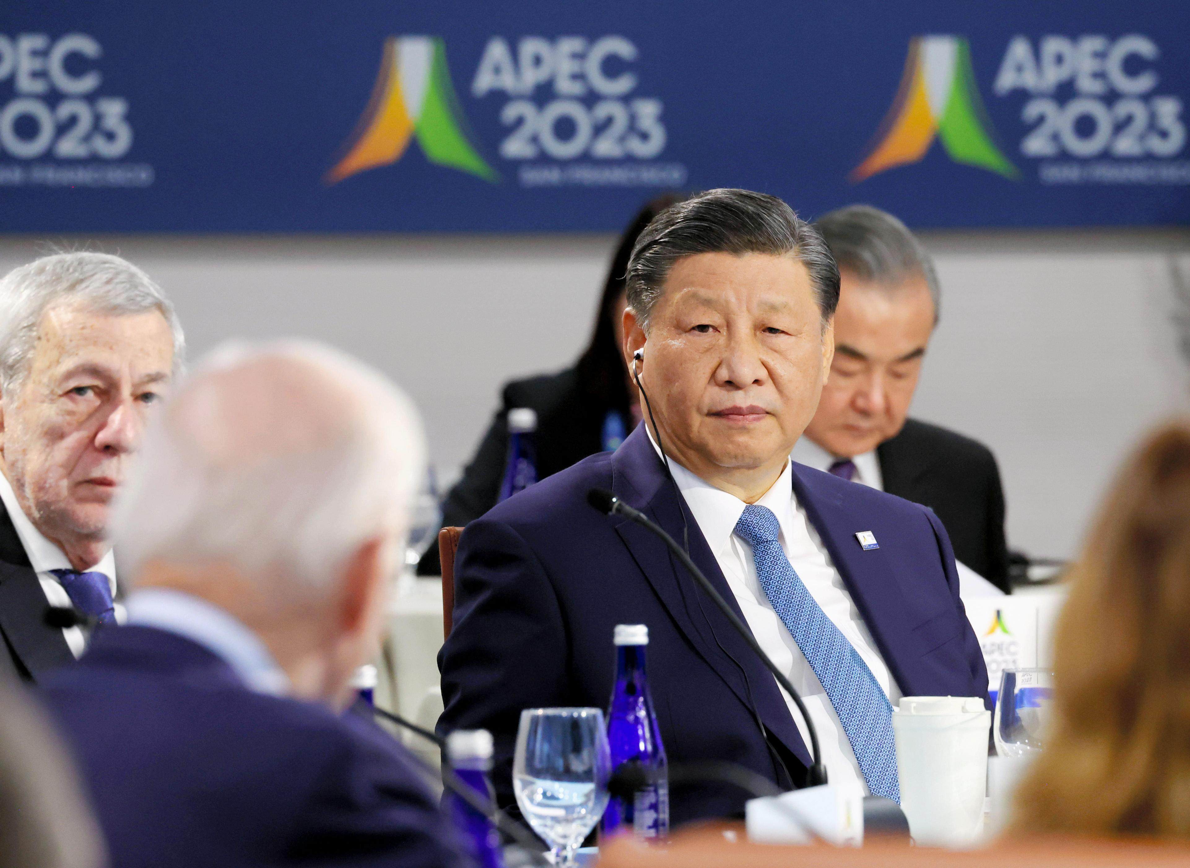 Chinese President Xi Jinping listens to US President Joe Biden during the closing session of the Apec summit in San Francisco on November 17. Photo: Kyodo
