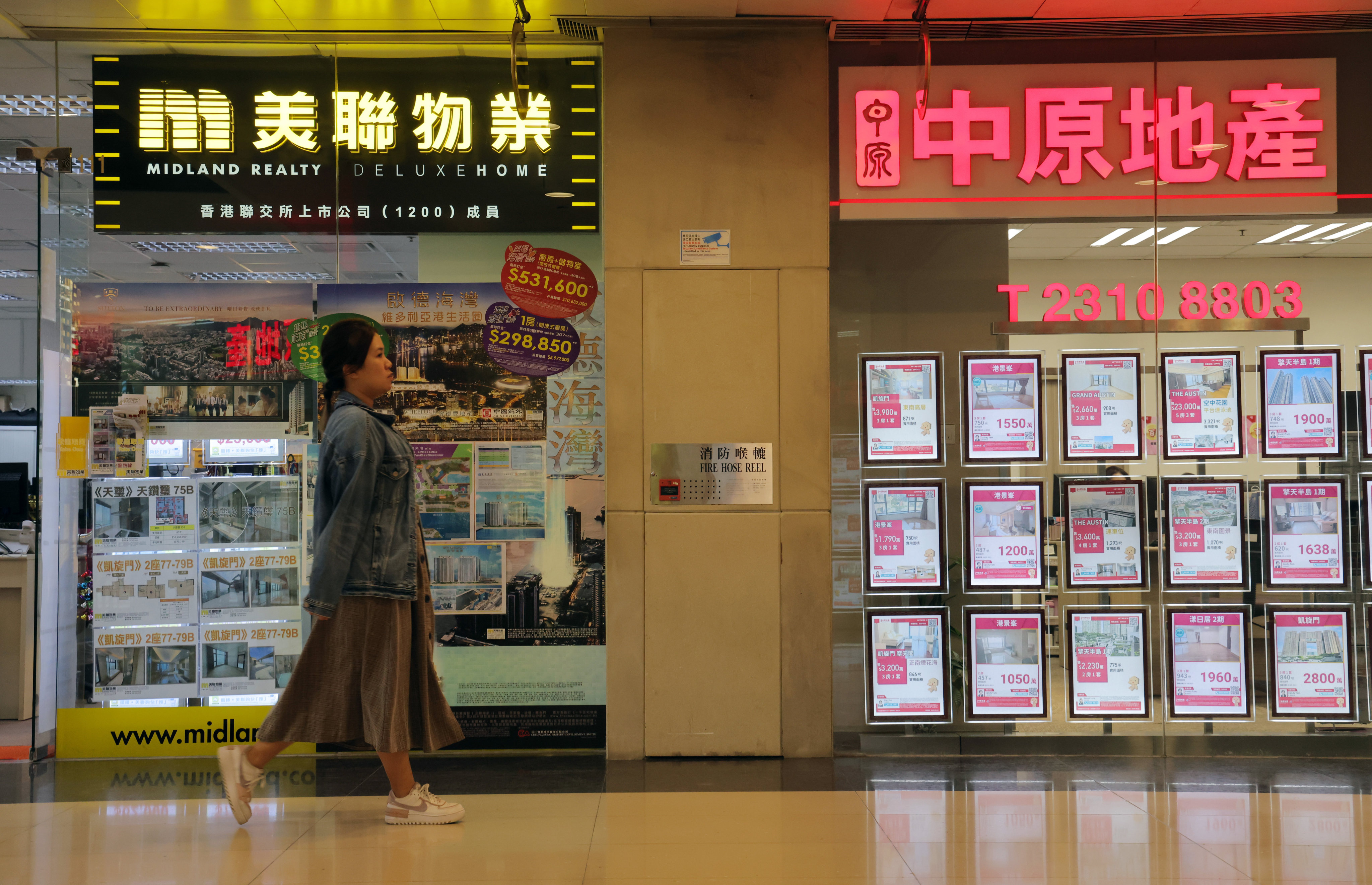Midland Realty and Centaline Property Agency are involved in nearly 90 per cent of all real estate transactions in Hong Kong. Photo: SCMP