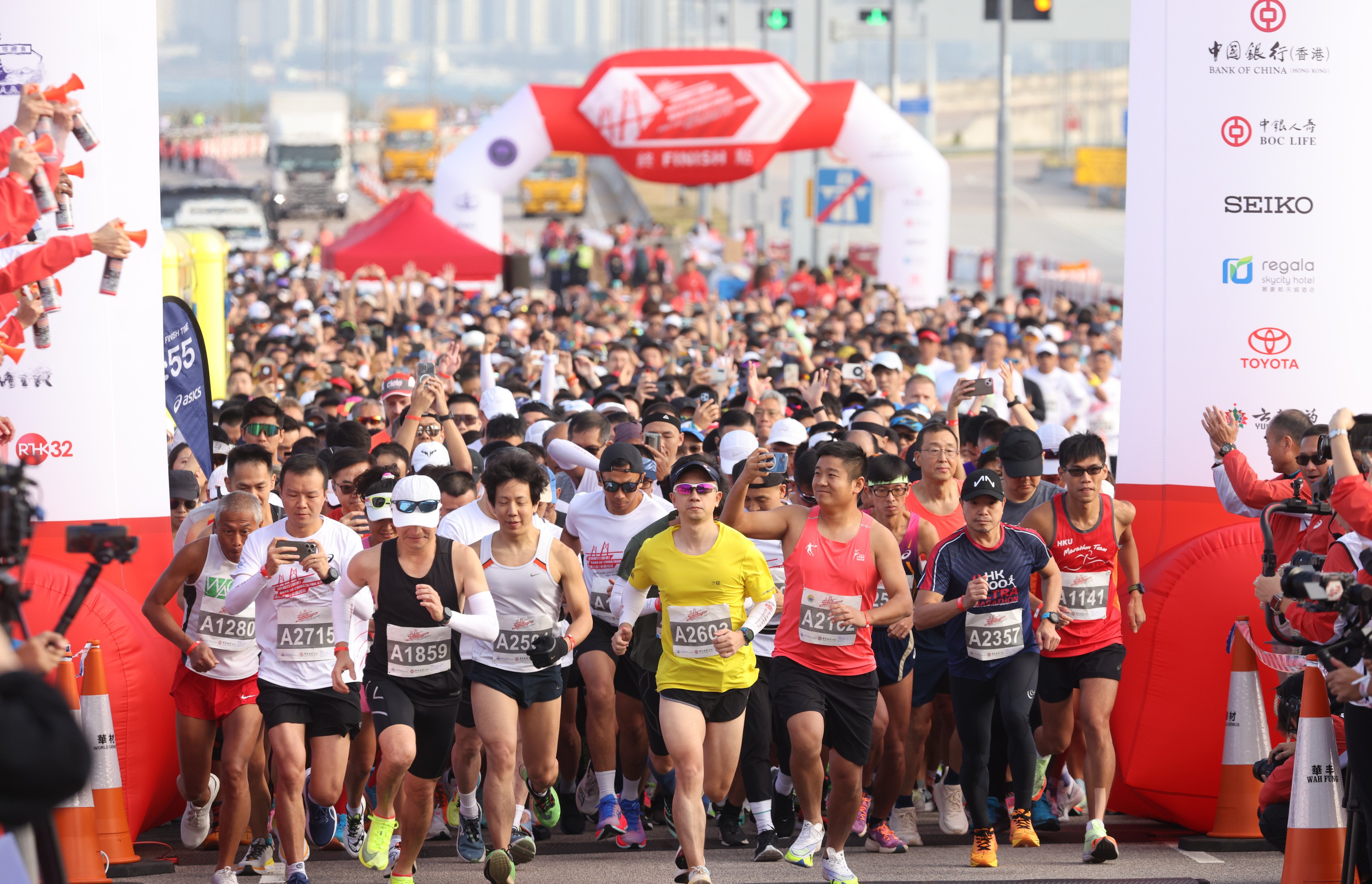 Organisers say 8,000 runners took part in the inaugural Hong Kong-Zhuhai-Macau Bridge Half Marathon. Photo: Yik Yeung-man