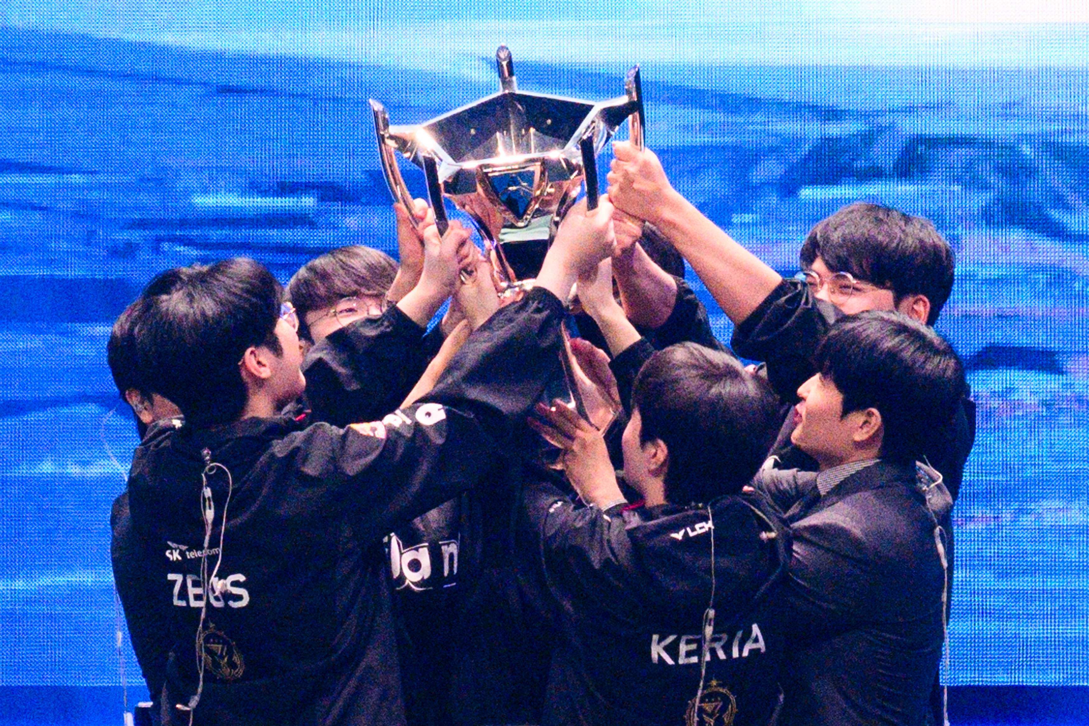South Korea’s T1 hold up their trophy after defeating China’s Weibo Gaming at the League of Legends world final. Photo: AFP