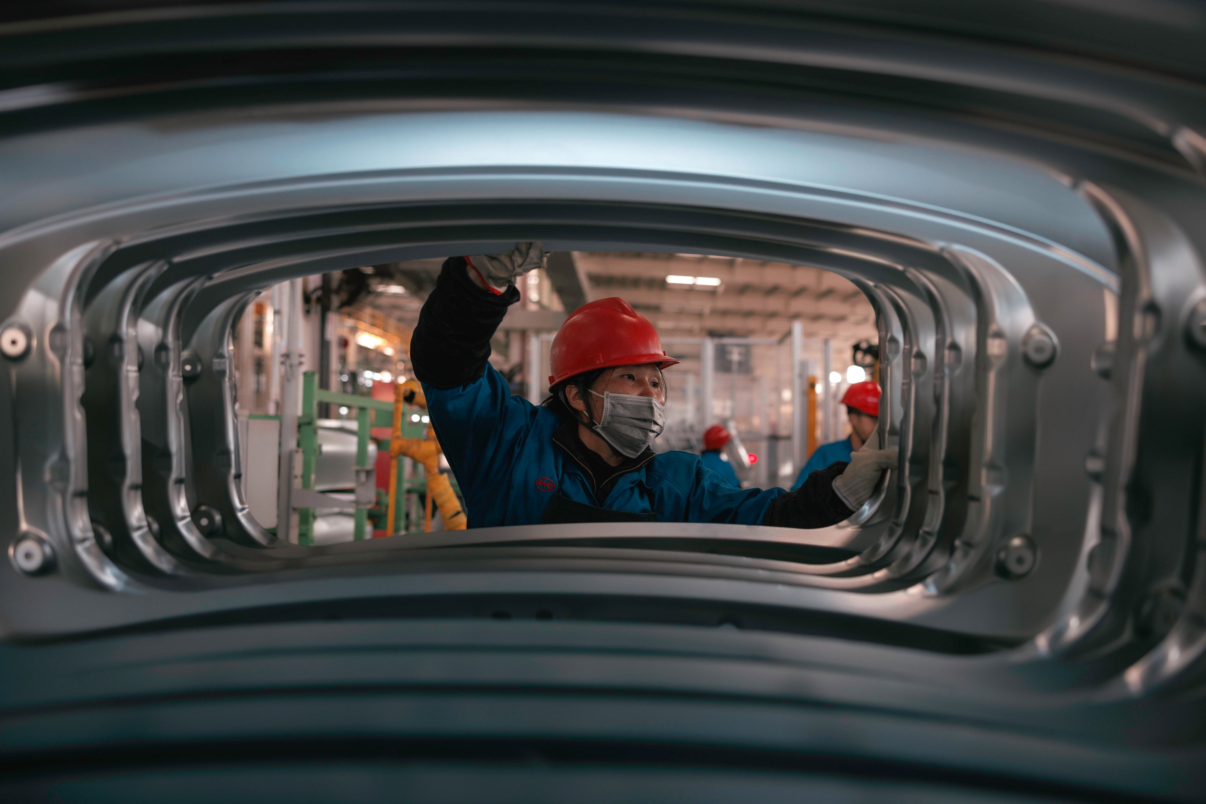 A person works in BYD electric cars factory in Changzhou, Jiangsu Province, China. Photo:EPA-EFE
