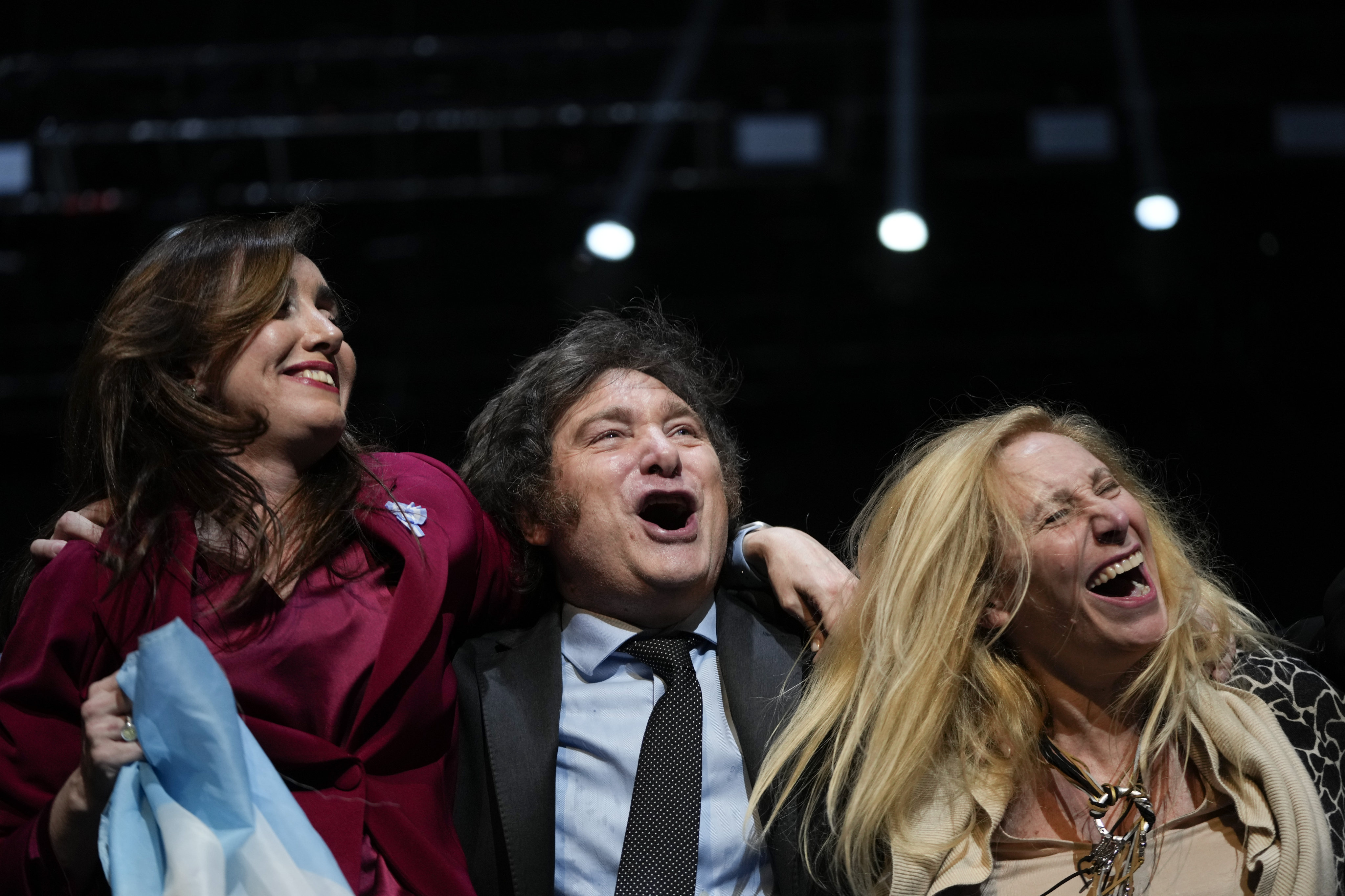 Presidential candidate Javier Milei (centre) is flanked by his running mate Victoria Villarruel (left) and his sister Karina during a campaign rally in Buenos Aires on Saturday. Photo: AP