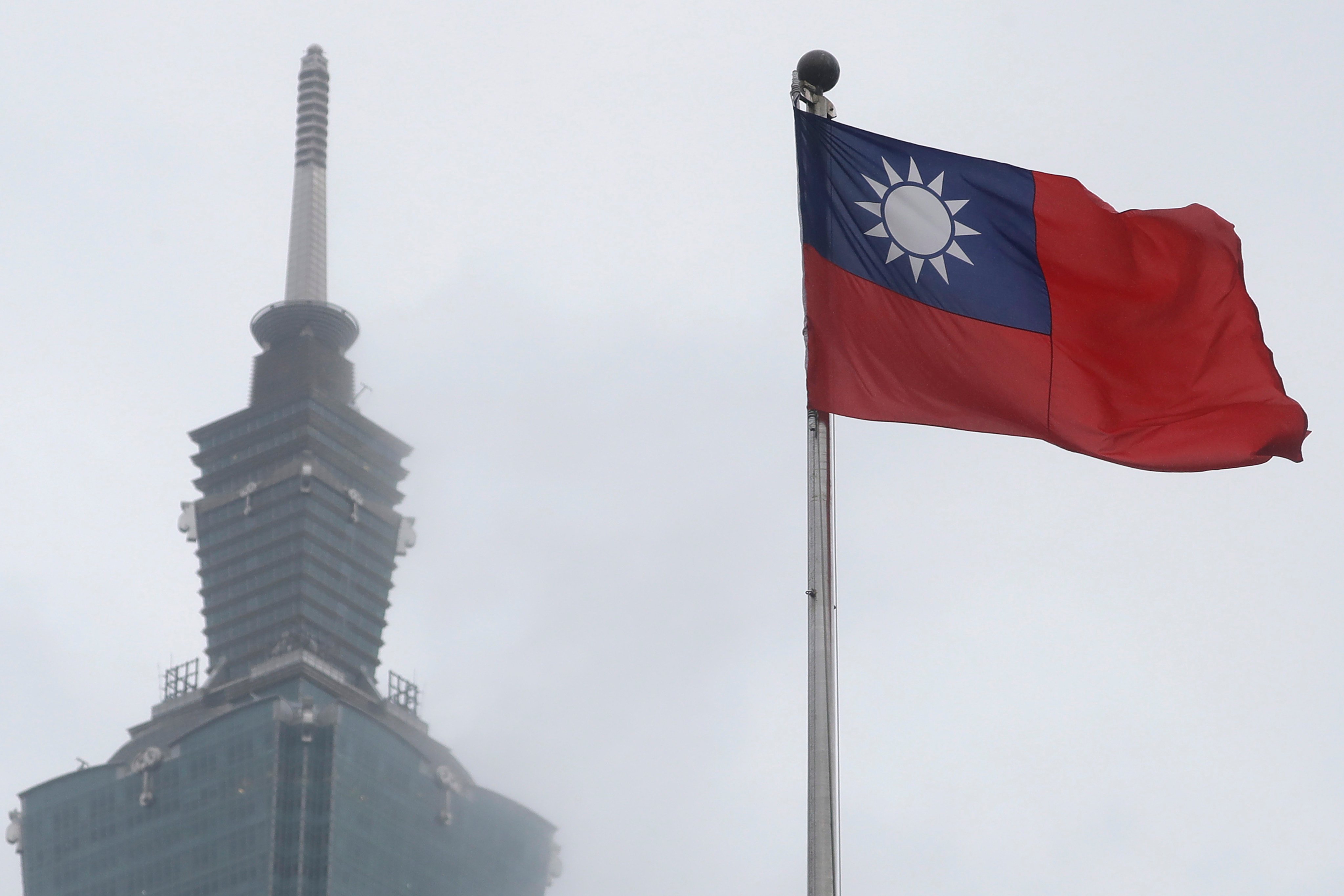 A Taiwanese national flag flutters at National Sun Yat-sen Memorial Hall in Taipei. The self-ruled island will hold its next presidential election on Jan. 13, 2024. Photo: AP