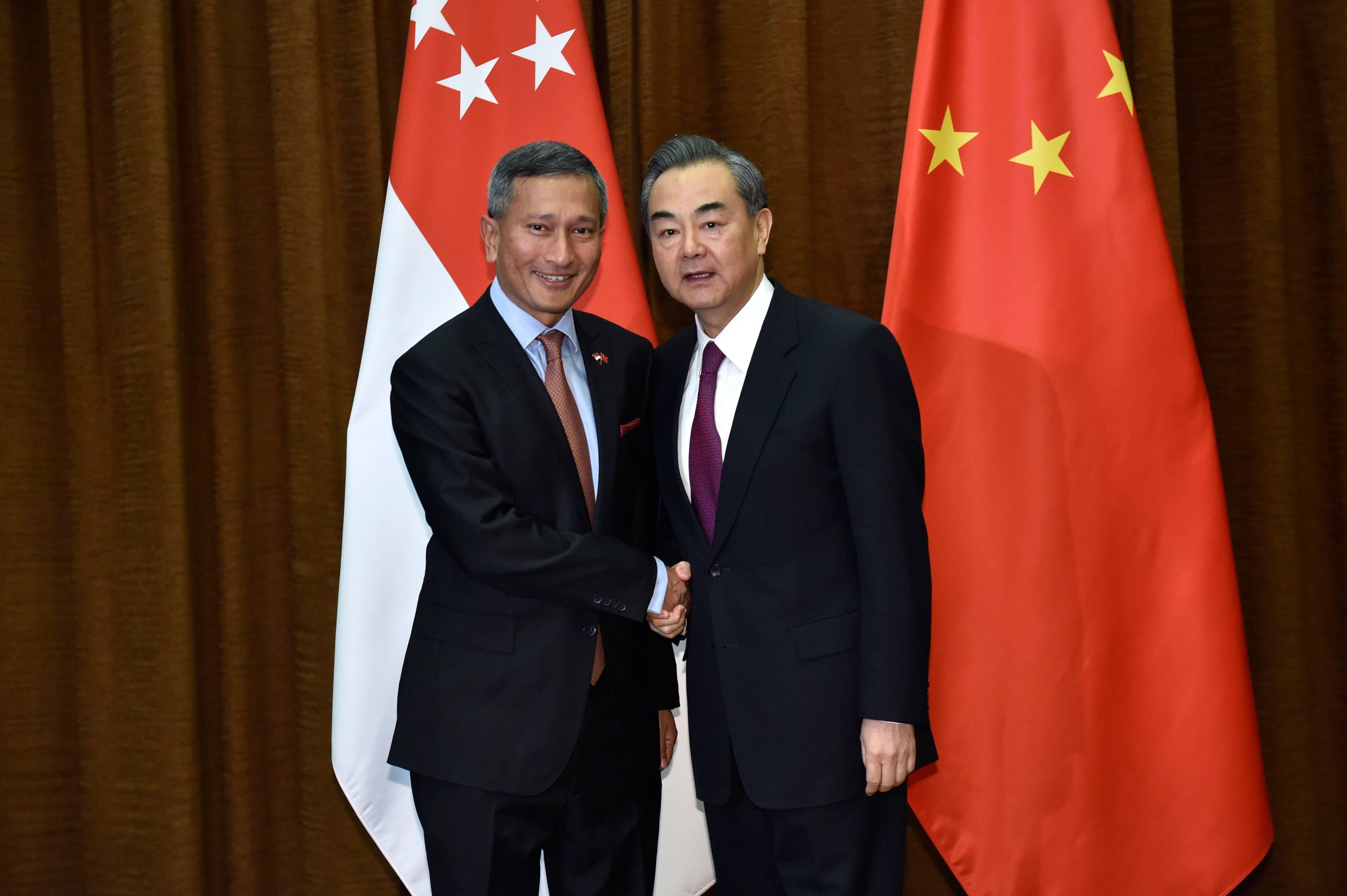 Singaporean Foreign Minister Vivian Balakrishnan (left) and his  Chinese counterpart Wang Yi, shown here in 2018, reaffirmed the “long-standing and substantive” relationship between their countries in a call on Wednesday. Photo: AFP