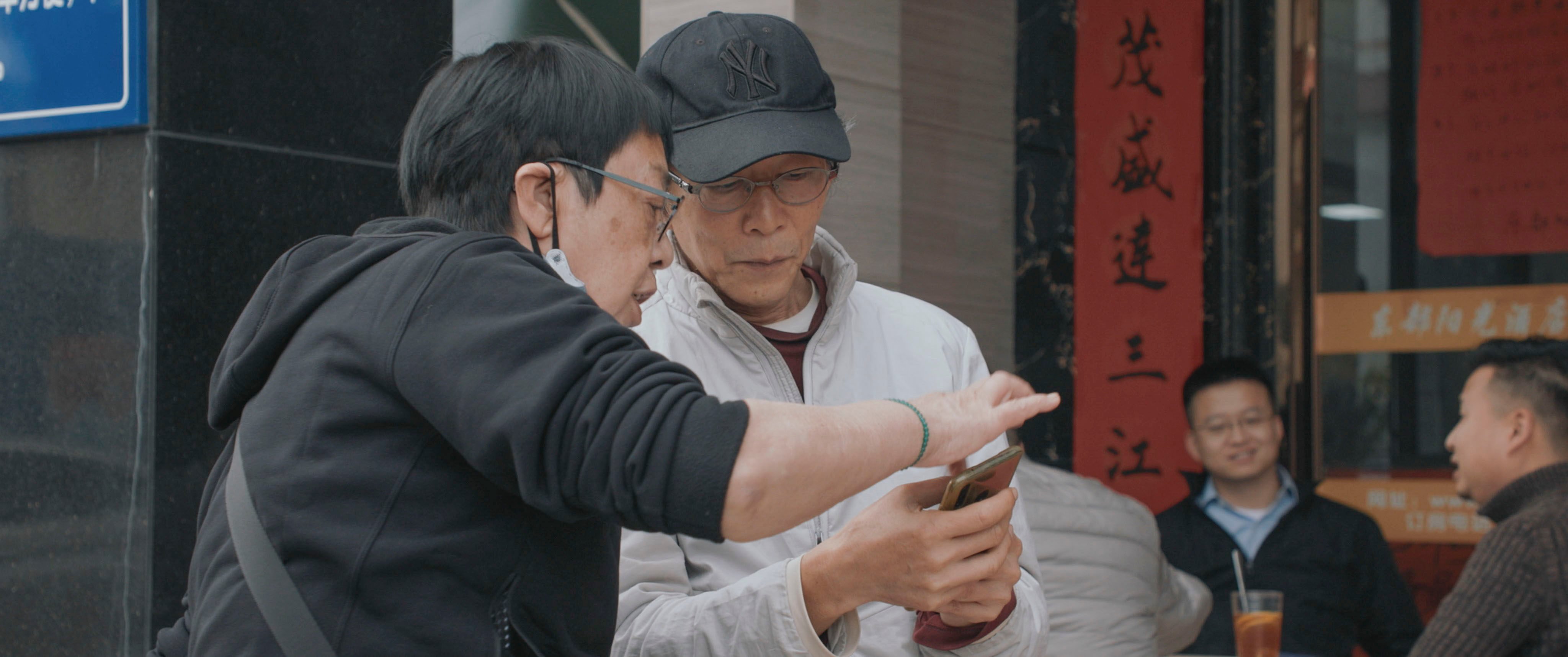 Director Ann Hui (left) and poet Huang Canran in a still from “Elegies”.