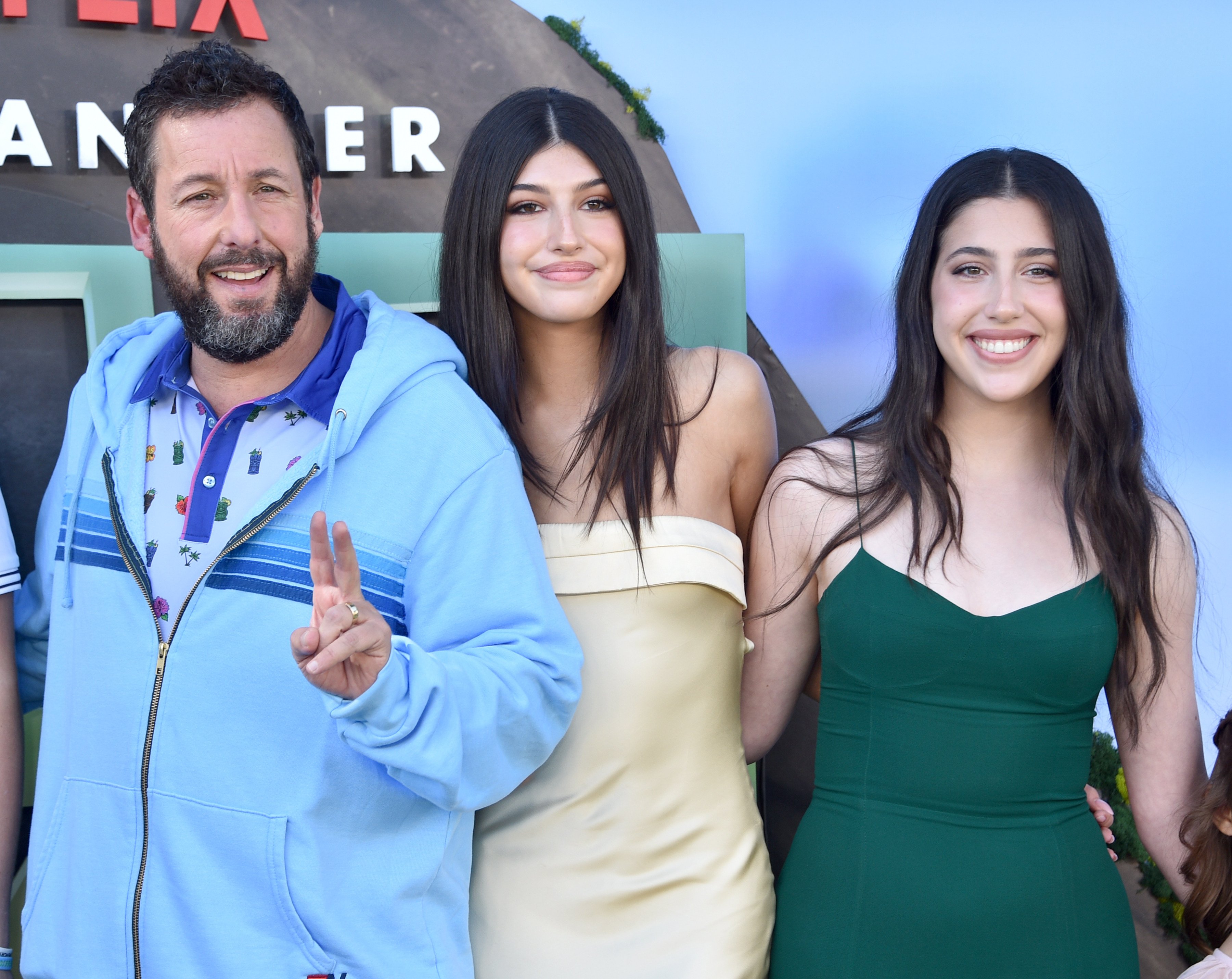Adam Sandler and his glamorous teenage daughters Sunny and Sadie Sandler at the premiere of Netflix’s Leo on November 19, in Los Angeles. Photo: FilmMagic