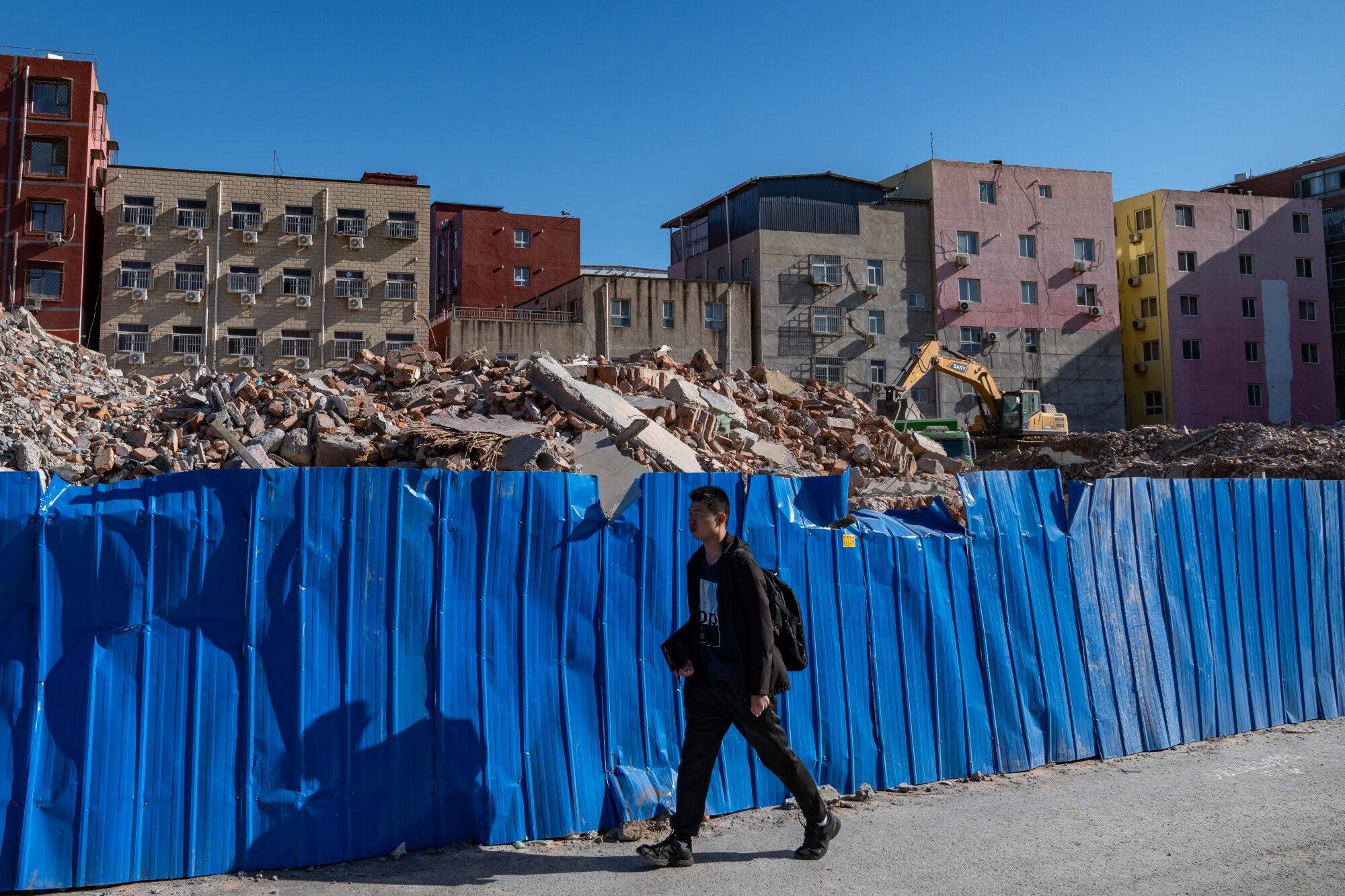 Demolished buildings are seen in a village in Beijing amid a slump in China’s property sector. Financing support among private developers could also be unevenly distributed, with most banks choosing to support top performers and companies that have not yet defaulted on their debt, according to Fitch. Photo: Bloomberg