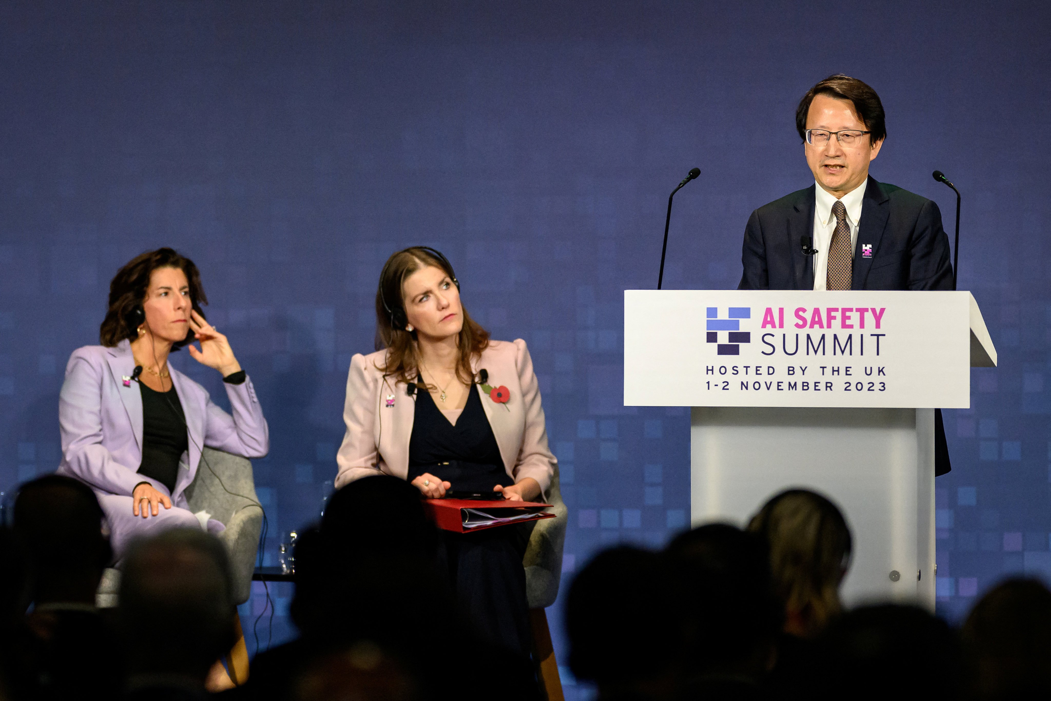 US Secretary of Commerce Gina Raimondo and British Secretary of State for Science, Innovation and Technology Michelle Donelan listen to China’s Vice-Minister of Science and Technology Wu Zhaohui speaking at the AI Safety Summit at Bletchley Park in Britain on November 1. Photo: Reuters