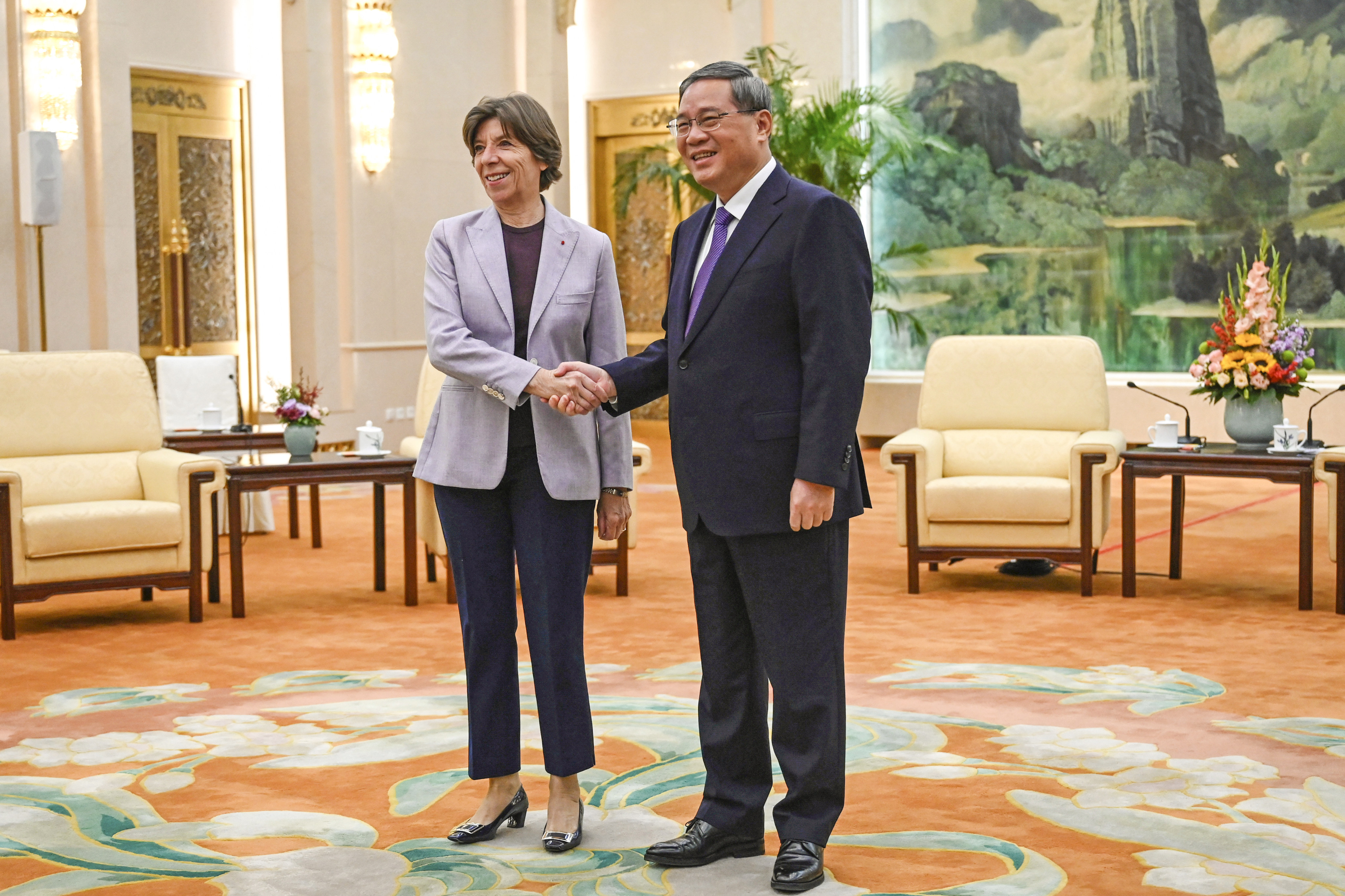 Chinese Premier Li Qiang greets French Foreign Minister Catherine Colonna in the Great Hall of the People in Beijing. Photo: AP