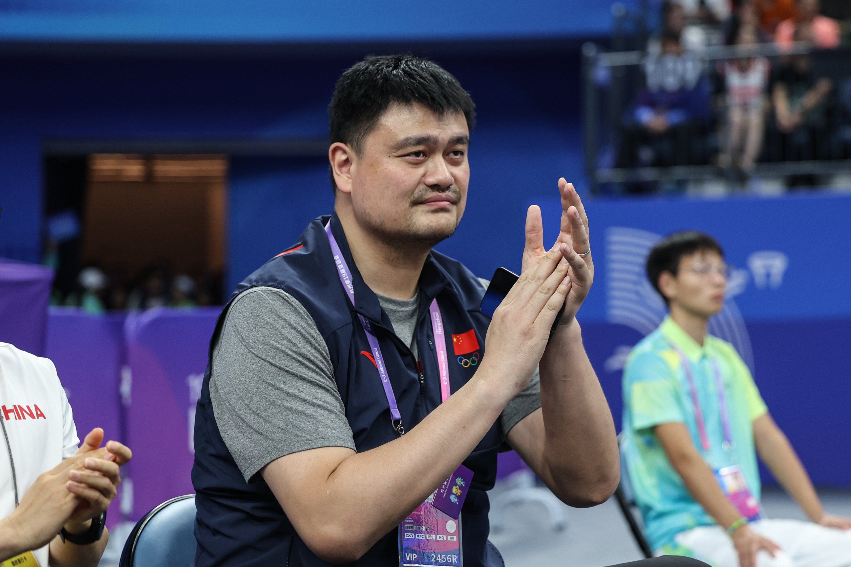 Chinese Basketball Association president Yao Ming watches the men’s Group B match between China and Chinese Taipei at the 19th Asian Games in Hangzhou. Photo: Xinhua