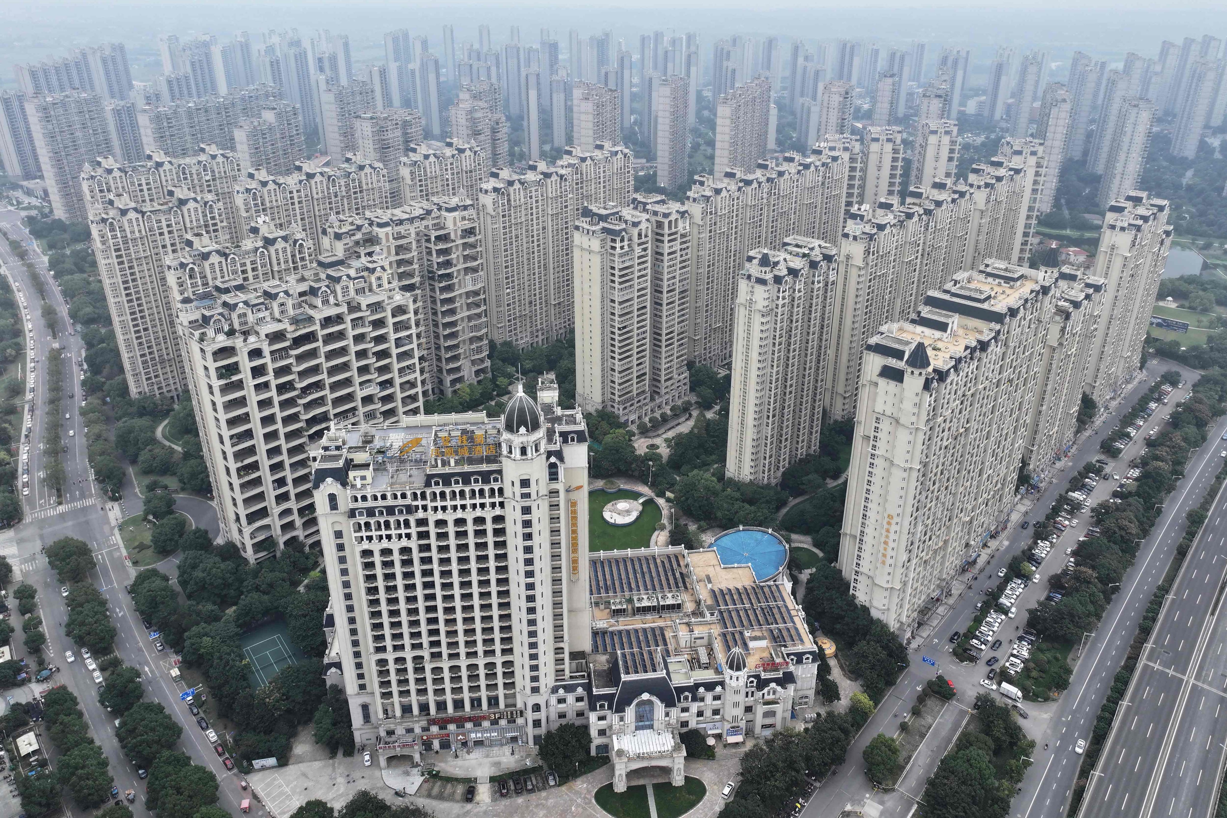 Apartment blocks built by Chinese developer Country Garden are seen in Zhenjiang, Jiangsu province, on October 10. Shares in the heavily indebted company have risen recently on signs that officials are planning more support for the troubled sector. Photo: AFP