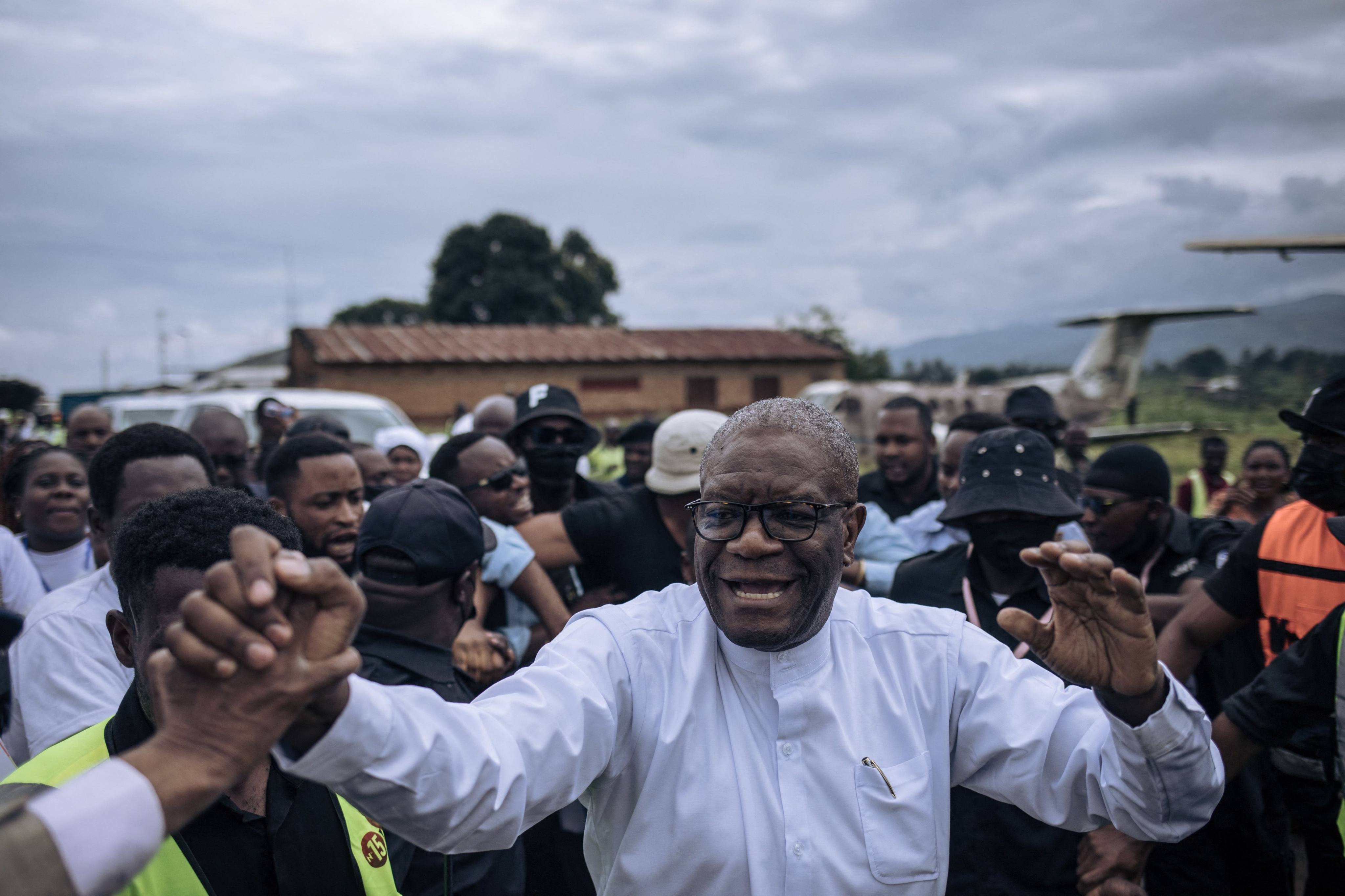 Congolese presidential candidate Denis Mukwege greets supporters outside Kavumu-Bukavu airport on Saturday. Photo: AFP