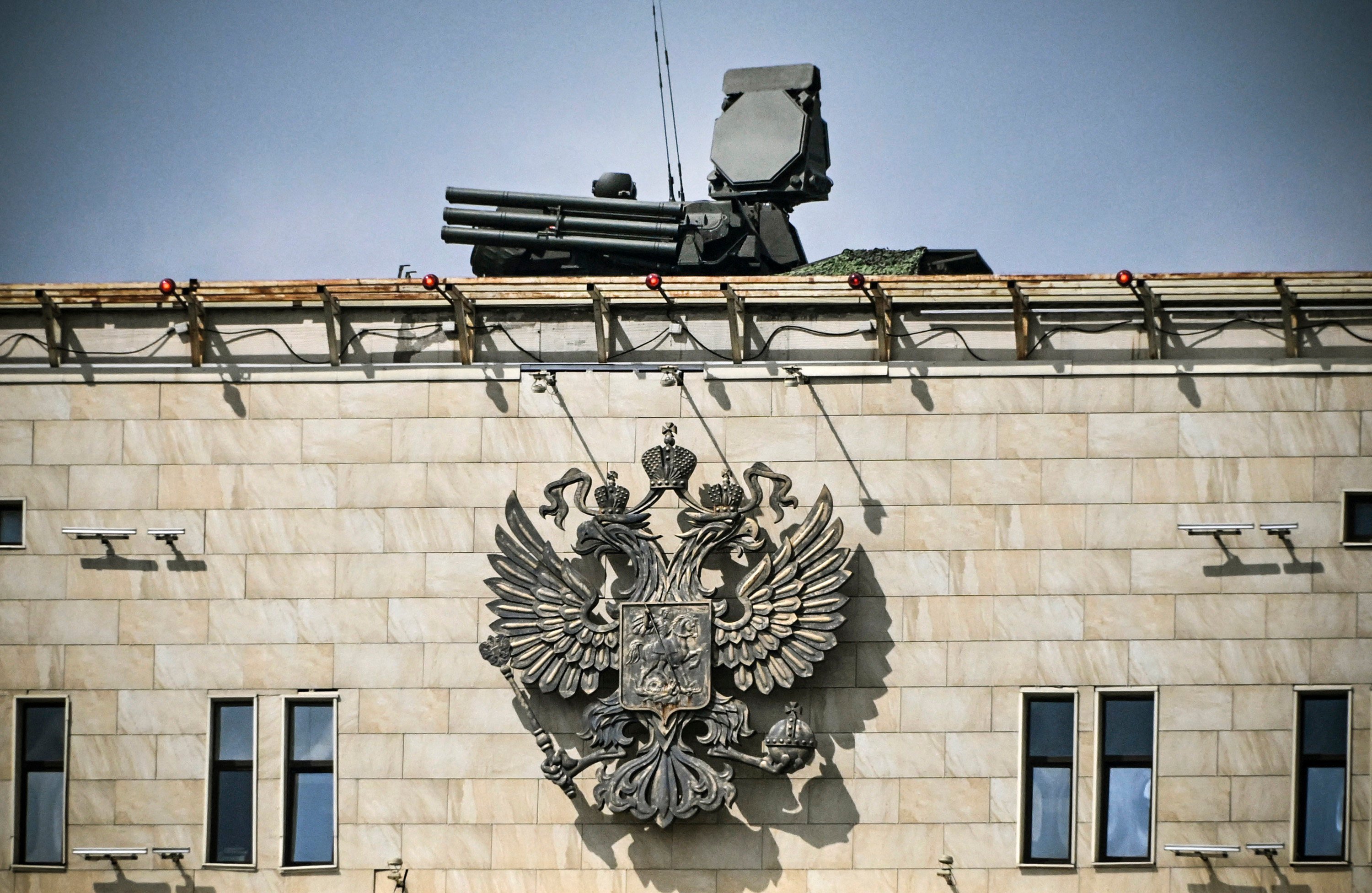 The Russian Coat Of Arms Sits On A Russian Flag Flying On The Roof Of The  Kremlin High-Res Stock Photo - Getty Images