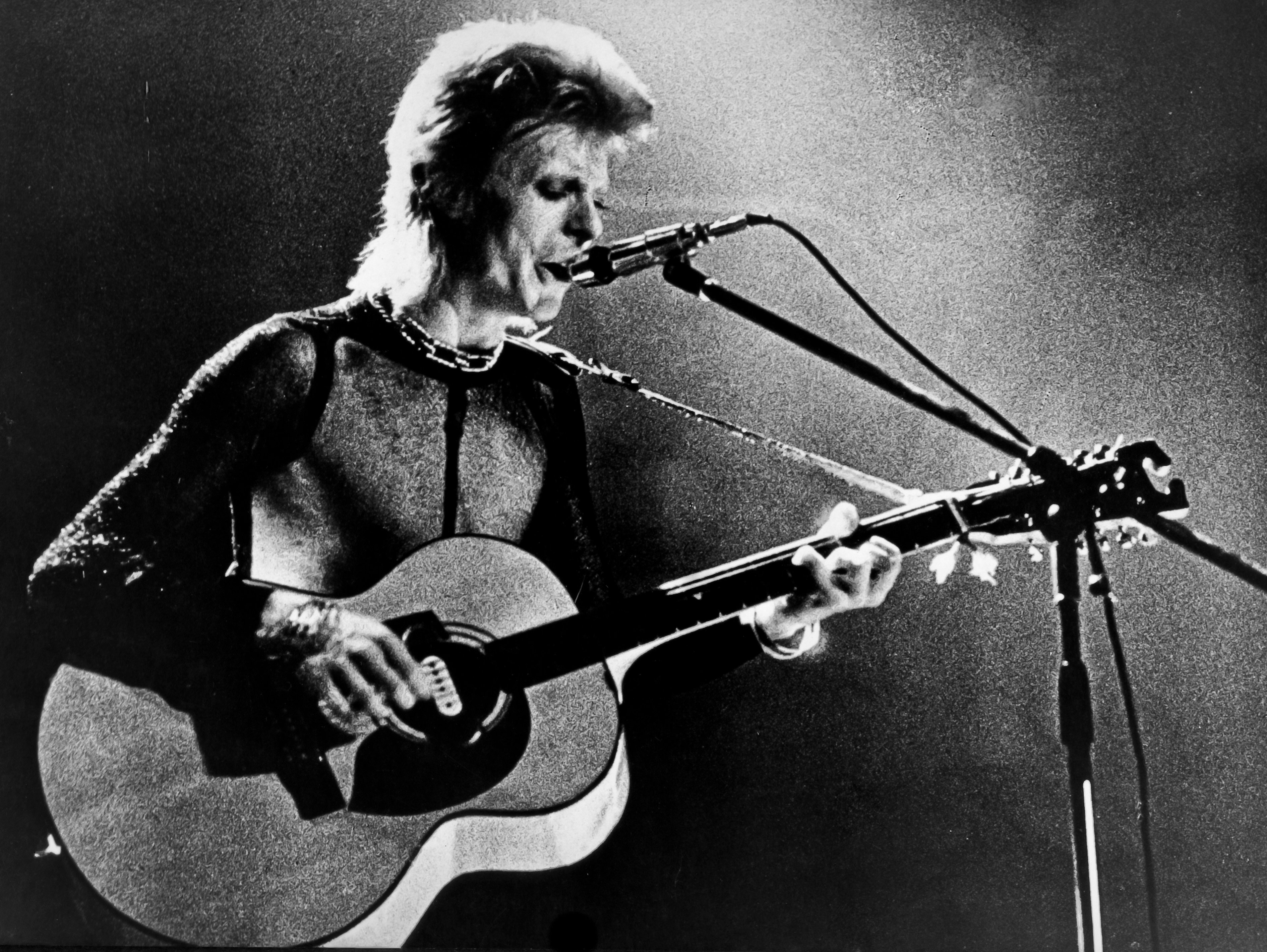 David Bowie during a performance in the 1970s. Photo: Getty Images