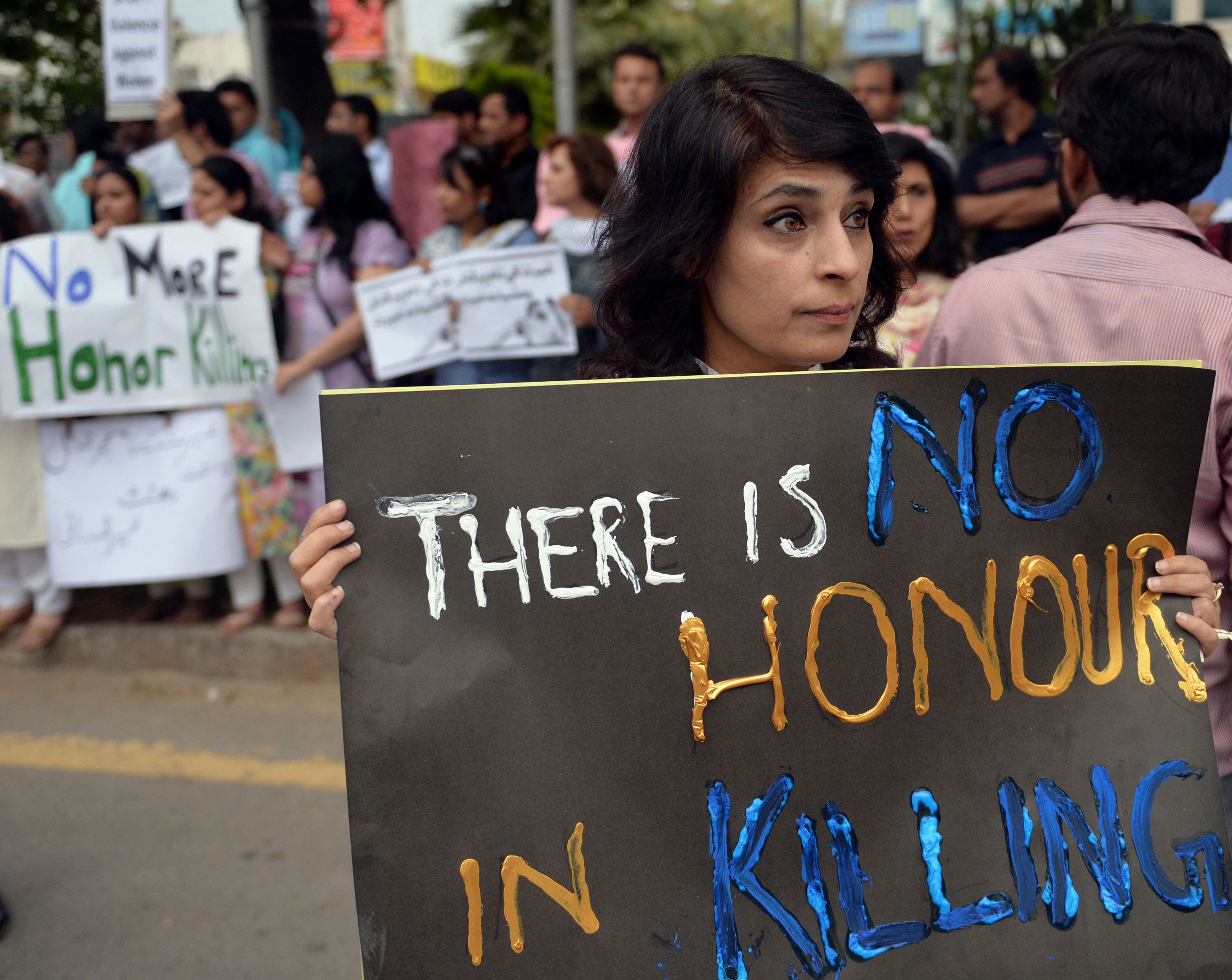 Pakistani human rights activists at a 2014 rally against honour killing. Around 1,000 women in Pakistan are killed yearly by relatives on the pretext of preserving the family’s honour. Photo: AFP