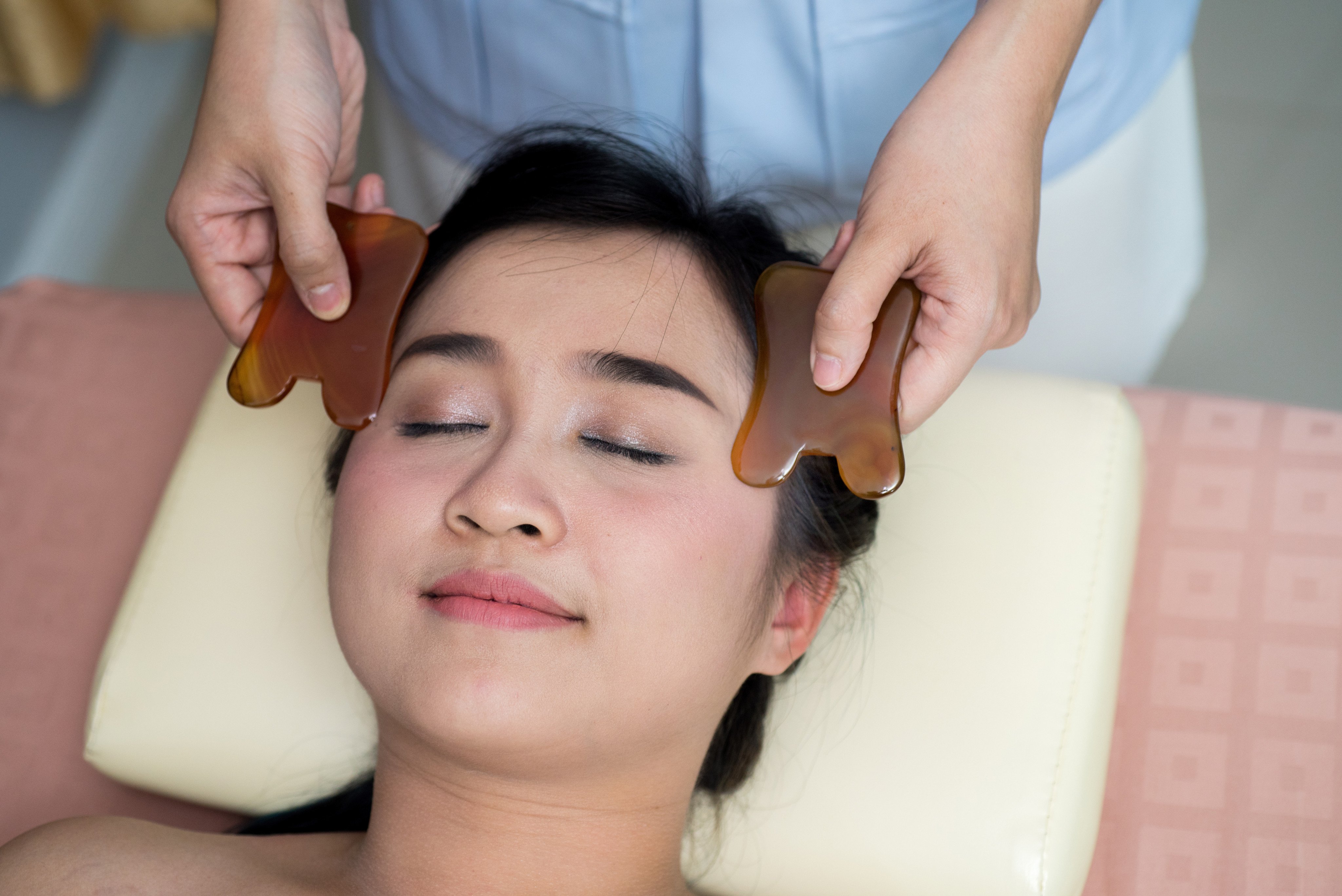 Gua sha, a traditional Chinese massage technique, is associated with lymphatic drainage, among other benefits. Photo: Shutterstock