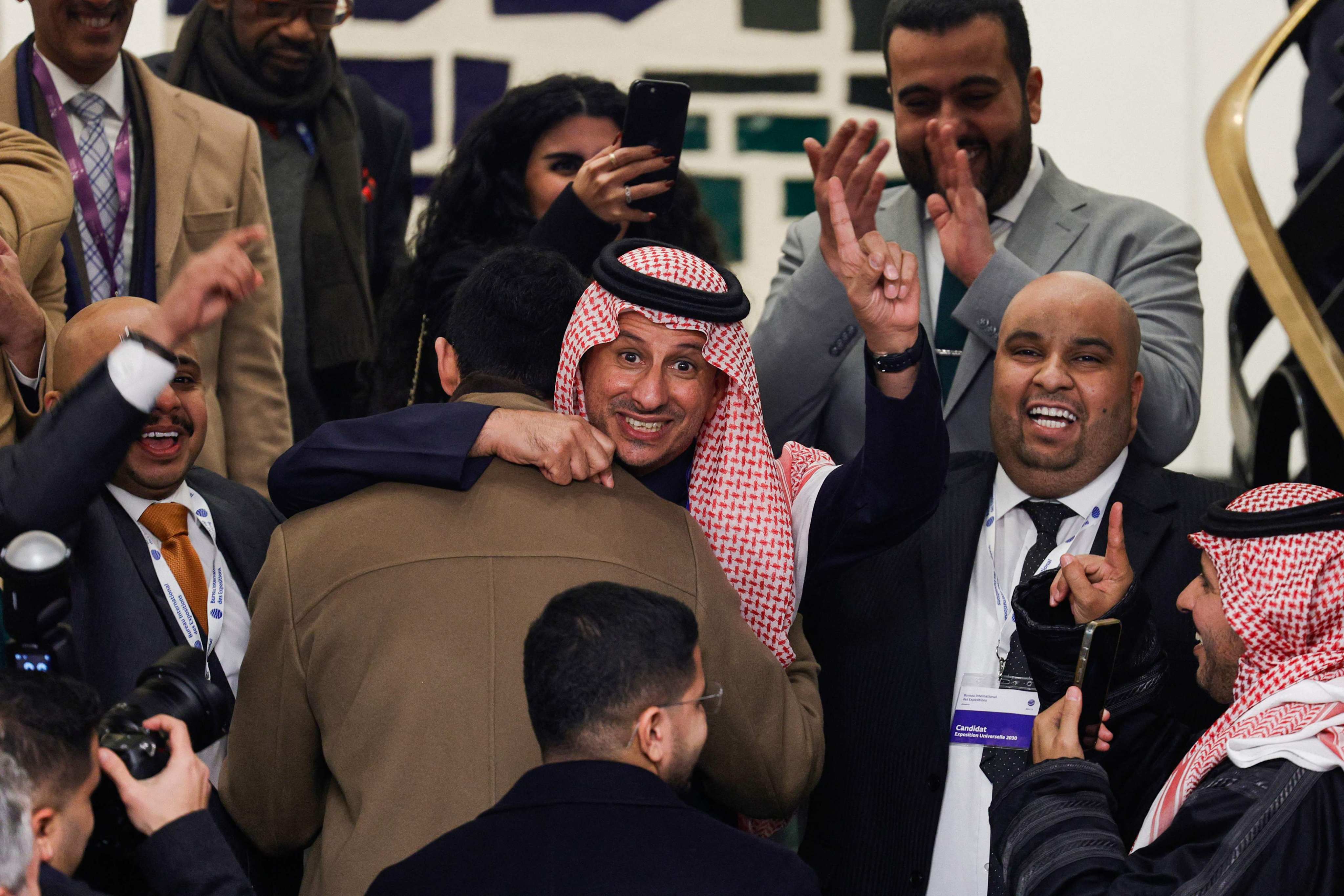 Members of Saudi Arabia’s Royal Commission for Riyadh City celebrate at the Palais des Congres in Issy-les-Moulineaux on Wednesday after winning the bid to host the 2030 World Expo. Photo: AFP