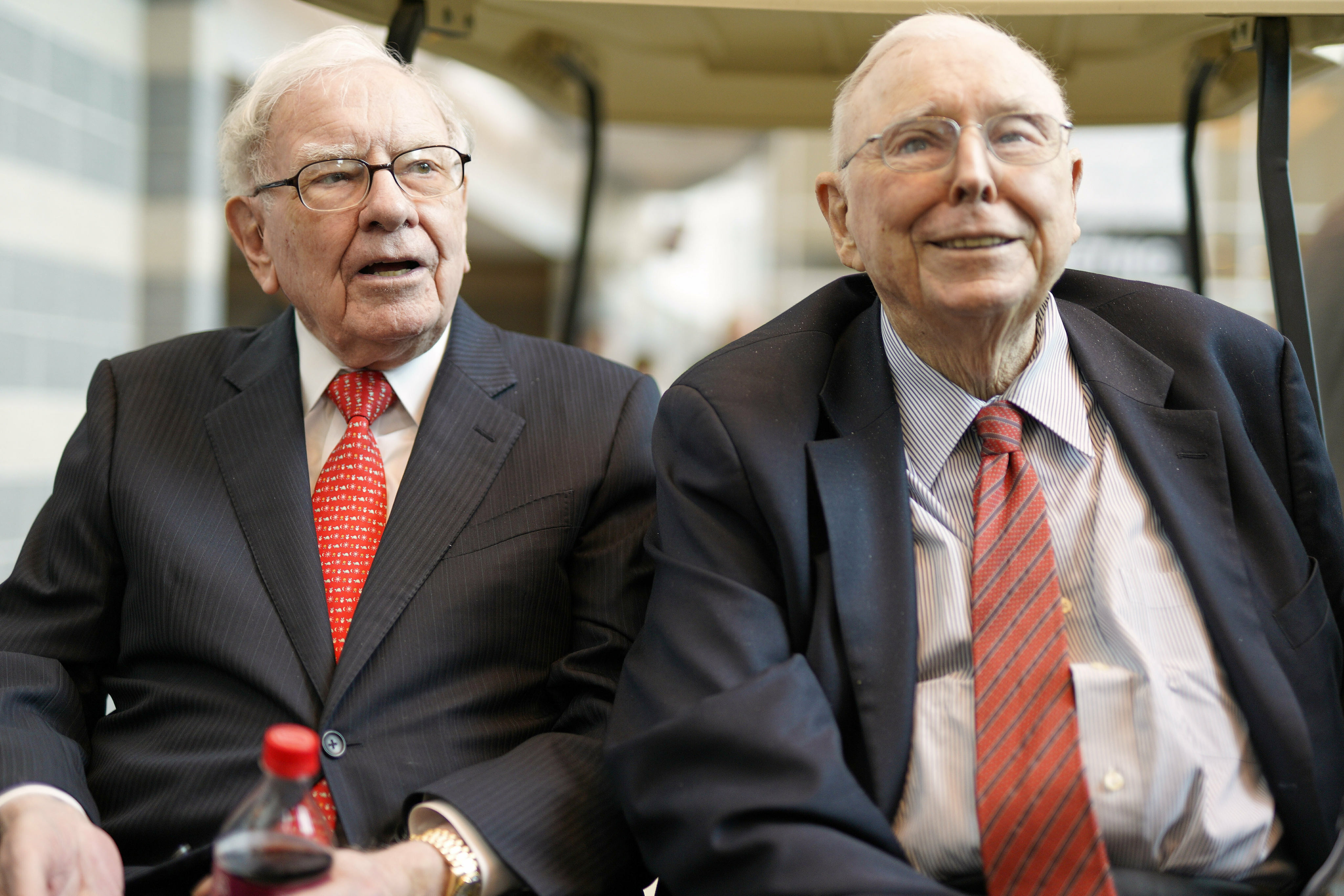 Berkshire Hathaway chairman Warren Buffett, left, and vice-chairman Charlie Munger chat with reporters on May 3, 2019. Munger, who helped Buffett build an investment powerhouse, has died at 99. Photo: AP