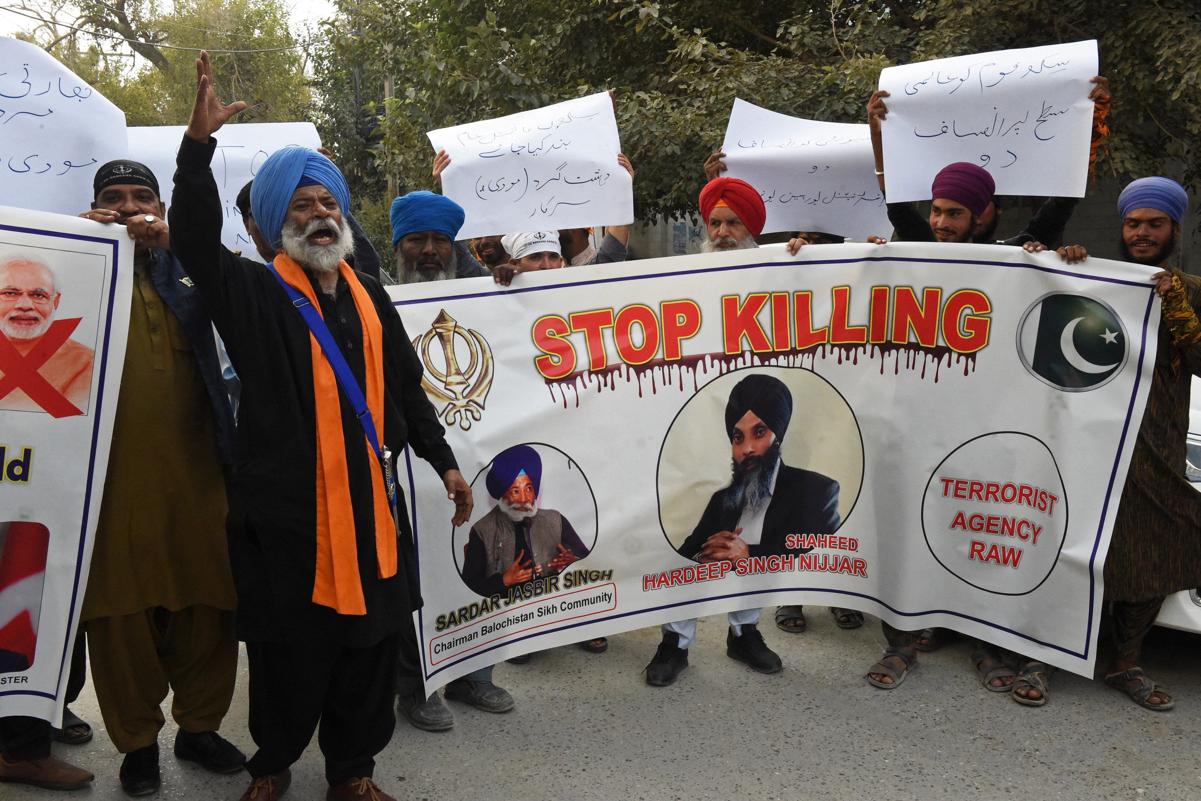 Members of Pakistan’s Sikh community shout slogans as they hold banners during a protest to condemn the killing of a Sikh separatist, Hardeep Singh Nijjar, in Canada. Ottawa concluded that Indian agents played a role in the June killing near Vancouver of a Sikh separatist, Hardeep Singh Nijjar. Photo: AFP