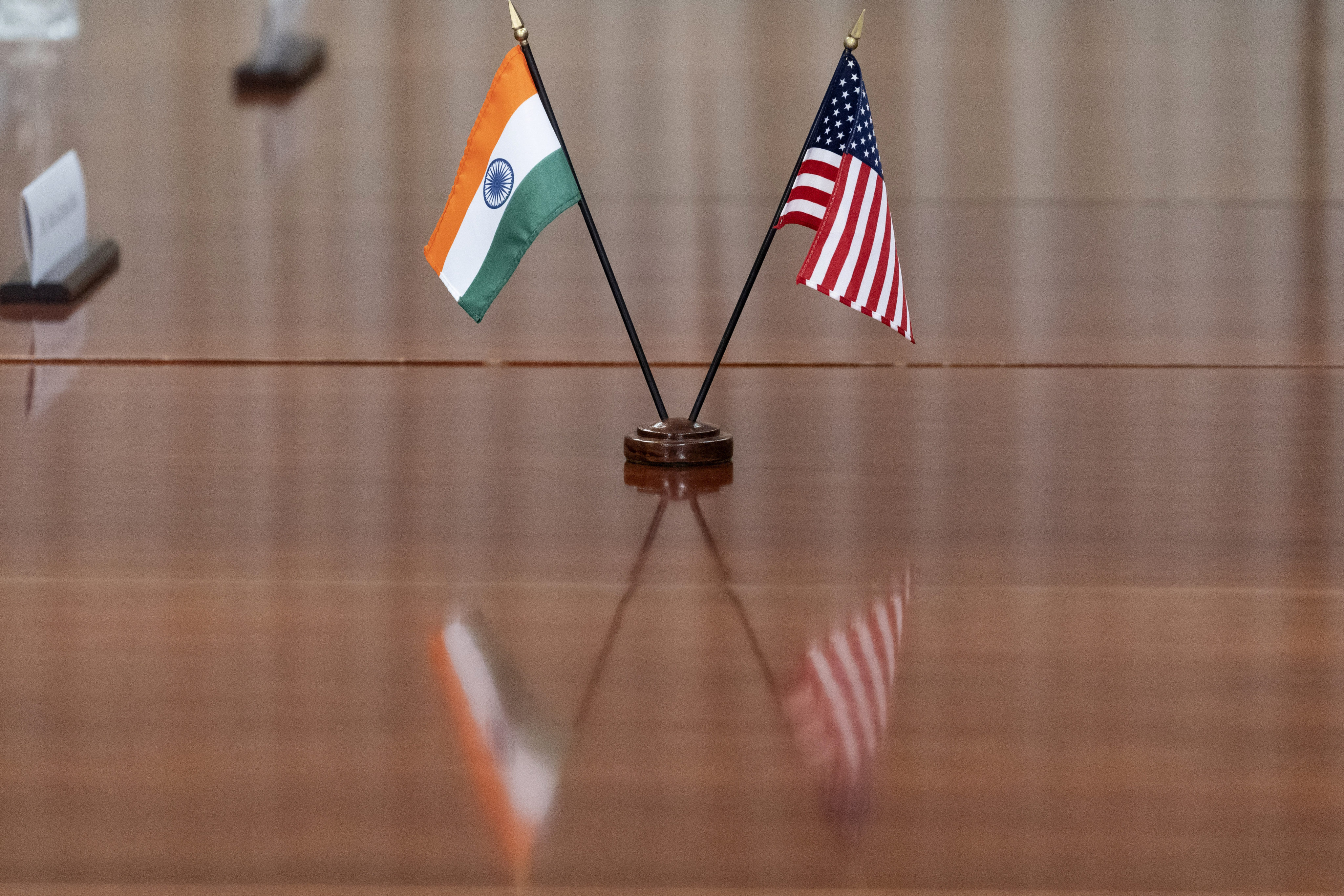 Indian and US flags are seen on the table during a meeting in Washington in September 2022. Photo: AP